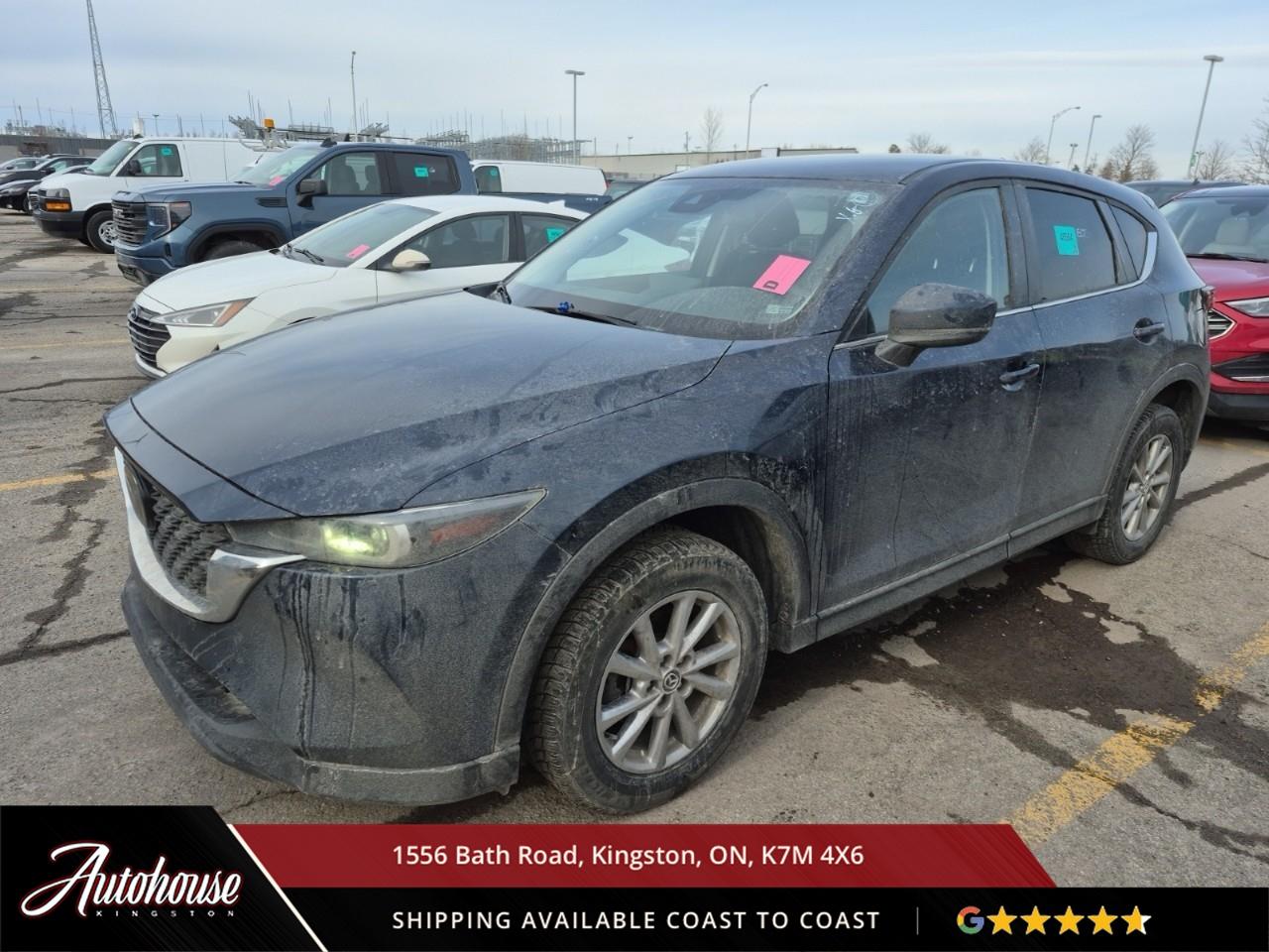 <p><strong>The 2022 Mazda CX-5 GX</strong><span style=color:rgba( 0 , 0 , 0 , 0.9 )>  Featuring a 2.5-liter Skyactiv-G inline-4 <strong>achieving an estimated 9.8 L/100km city and 7.9 L/100km highway fuel efficiency</strong>. The GX trim showcases premium cloth seating, includes heated front seats, leather-wrapped steering wheel and shift knob, dual-zone automatic climate control, and an 8.8-inch Mazda Connect infotainment display with Apple CarPlay, Android Auto, Bluetooth hands-free phone and audio streaming, and a 6-speaker audio system. i-Activsense safety technology includes Advanced Blind Spot Monitoring, Rear Cross Traffic Alert, Smart City Brake Support with pedestrian detection, Lane Departure Warning, and Rear Parking Sensors. Additional features include keyless entry with push-button start, heated power side mirrors, and so much more.</span></p>