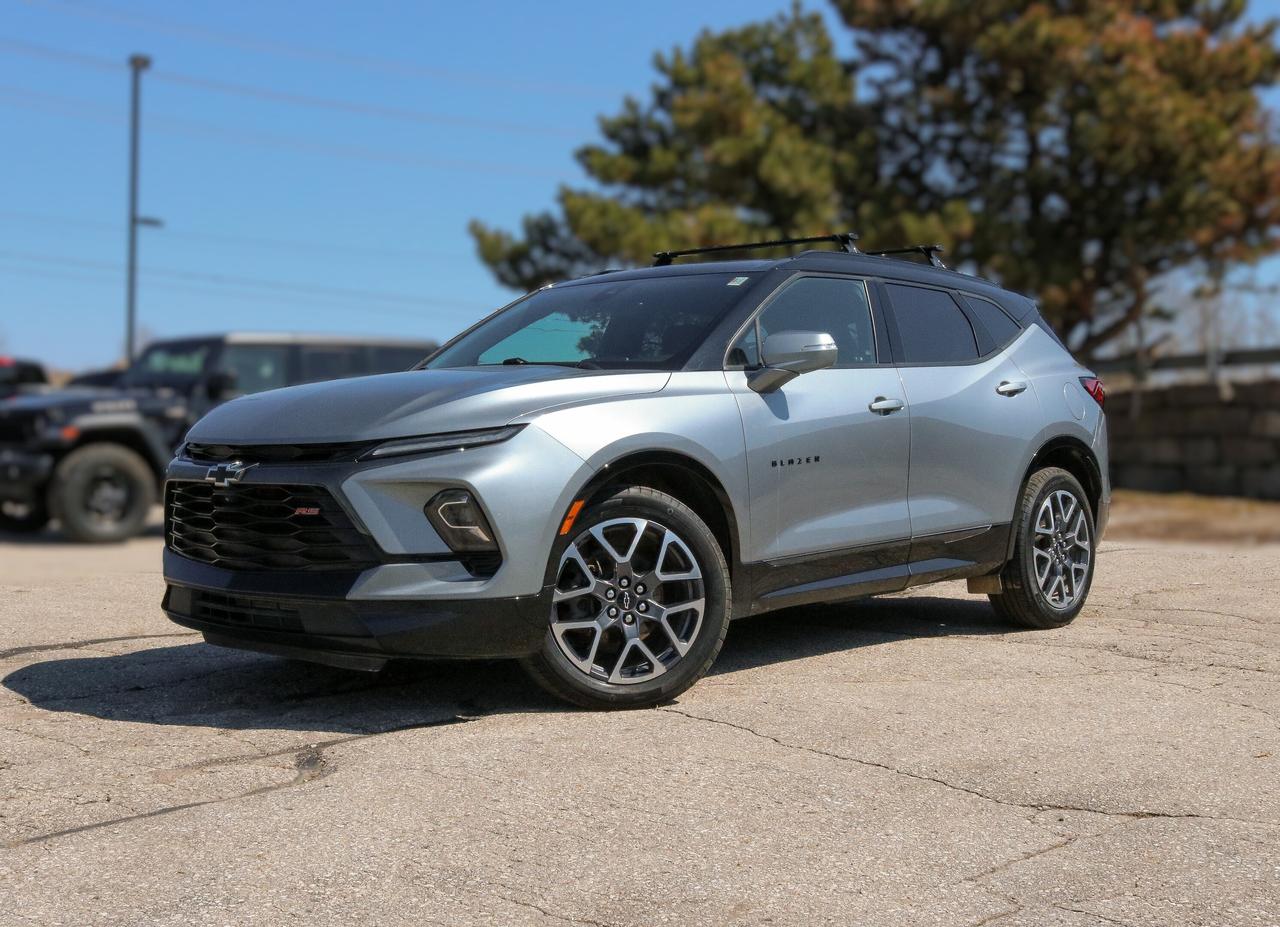NAVIGATION, PANORAMIC SUNROOF, BACKUP CAMERA, BLUETOOTH, HEATED SEATS, BLIND SPOT, REMOTE START, AND MORE !!!

Our One Owner, Accident-Free 2024 Chevrolet Blazer RS AWD can accelerate your pulse rate along with its performance in Sterling Gray Metallic! Motivated by a 3.6 Litre V6 that serves up 308hp to a 9 Speed Automatic transmission for powerful capability. Also boasting advanced twin-clutch AWD, this All Wheel Drive SUV achieves approximately 9.0L/100km on the highway with an appearance designed to draw stares. Check out our Blazers strong lines, signature RS grille, LED lighting, hands-free liftgate, dual rectangular exhaust outlets, black bodyside moldings, heated power mirrors, black Bowties, a sunroof, and 20-inch alloy wheels.

Comfortable accommodations and commanding technology are at your service in our RS cabin. It treats you to heated leather power front seats, a versatile back row, a heated-wrapped steering wheel, dual-zone automatic climate control, and a 120V power outlet. The adventure-friendly infotainment system bundles a 10.2-inch touchscreen, an 8-inch driver display, connected navigation, Bose audio, wireless Apple CarPlay&reg;/Android Auto&reg;, WiFi compatibility, wireless charging, and Bluetooth&reg;.

Enjoy safer journeys with advanced Chevrolet features like automatic braking, lane-keeping assistance, rear cross-traffic alert, blind-spot monitoring, forward collision warning, an HD rearview camera, a rear-seat reminder, and more. Fire up our Blazer RS and free yourself from ordinary driving! Save this Page and Call for Availability. We Know You Will Enjoy Your Test Drive Towards Ownership! 

Bustard Chrysler prides ourselves on our expansive used car inventory. We have over 100 pre-owned units in stock of all makes and models, with the largest selection of pre-owned Chrysler, Dodge, Jeep, and RAM products in the tri-cities. Our used inventory is hand-selected and we only sell the best vehicles, for a fair price. We use a market-based pricing system so that you can be confident youre getting the best deal. With over 25 years of financing experience, our team is committed to getting you approved - whether you have good credit, bad credit, or no credit! We strive to be 100% transparent, and we stand behind the products we sell. For your peace of mind, we offer a 3 day/250 km exchange as well as a 30-day limited warranty on all certified used vehicles.