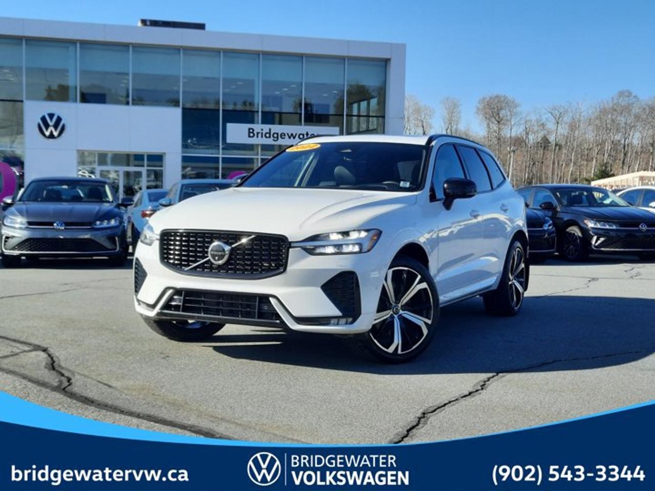 New Price! 2022 Volvo XC60 B6 R-DesignAWD | Apple CarPlay | Android Auto | Sirus XM Certified.This vehicle is a Steele Certified Pre-Owned Vehicle, offering added confidence through enhanced inspection standards and dealership-backed benefits. Steele Certified Reconditioning Process: Comprehensive multi-point inspection Mechanical and cosmetic reconditioning completed as needed Brake, tire, and battery assessment Professional detailing Final quality control road test Steele Certified Pre-Owned vehicles include additional ownership benefits. Any concerns related to the certification process must be reviewed and addressed by the original selling dealer.CARFAX Canada No Reported AccidentsCrystal White Metallic AWD Automatic with Geartronic 2.0L I4 Turbocharged DOHC 16V LEV3-SULEV30 AWD, 14 Speakers, 4-Wheel Disc Brakes, ABS brakes, Air Conditioning, Alloy wheels, AM/FM radio: SiriusXM, Anti-whiplash front head restraints, Auto High-beam Headlights, Auto-dimming door mirrors, Auto-dimming Rear-View mirror, Automatic temperature control, Brake assist, Bumpers: body-colour, Delay-off headlights, Driver door bin, Driver vanity mirror, Dual front impact airbags, Dual front side impact airbags, Electronic Stability Control, Emergency communication system: Volvo Cars App w/4 Year Subscription, Exterior Parking Camera Rear, Four wheel independent suspension, Front anti-roll bar, Front Bucket Seats, Front dual zone A/C, Front fog lights, Front reading lights, Fully automatic headlights, Garage door transmitter: HomeLink, harman/kardon? Speakers, Heated door mirrors, Heated front seats, Heated Front Sport Seats, Illuminated entry, Knee airbag, Leather Shift Knob, Low tire pressure warning, Memory seat, Nappa Leather w/Open Grid Textile Upholstery, Navigation System, Occupant sensing airbag, Outside temperature display, Overhead airbag, Panic alarm, Passenger door bin, Passenger vanity mirror, Power door mirrors, Power driver seat, Power Liftgate, Power moonroof, Power passenger seat, Power steering, Power windows, Radio data system, Radio: harman/kardon Premium Sound, Rain sensing wipers, Rear air conditioning, Rear anti-roll bar, Rear dual zone A/C, Rear fog lights, Rear reading lights, Rear window defroster, Rear window wiper, Remote keyless entry, Security system, Speed control, Split folding rear seat, Spoiler, Sport steering wheel, Steering wheel mounted audio controls, Tachometer, Telescoping steering wheel, Tilt steering wheel, Traction control, Trip computer, Turn signal indicator mirrors, Variably intermittent wipers, Wheels: 19 5-Double Spoke Diamond Cut Alloy.