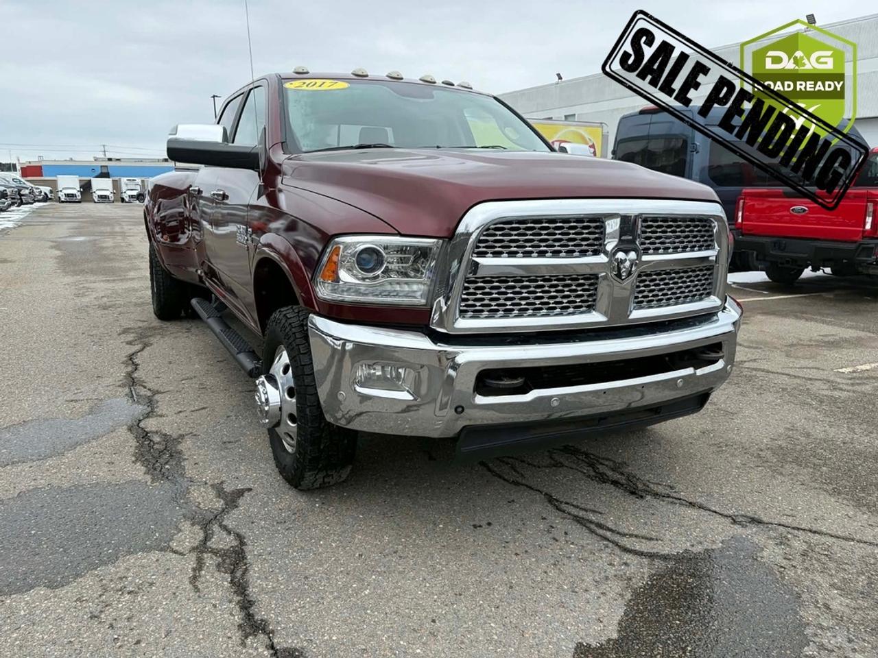 The 2017 Ram 3500 Laramie Crew Cab 4x4 Dually in Red Pearl delivers extreme heavy-duty capability, legendary Cummins diesel power, and premium comfort in a work-ready luxury truck. Equipped with the AISIN heavy-duty transmission, dual rear wheels, and advanced towing features, this Ram is built to handle the toughest jobs with confidence and style.

Highlight Features: 

6.7L Cummins - I-6 Turbo Diesel Engine - Delivers up to 385 horsepower and 900 lb-ft of torque when paired with the AISIN transmission, providing massive pulling power for serious towing and hauling.6-Speed AISIN Heavy-Duty Automatic Transmission - Designed for commercial-grade durability and optimized for high torque loads and towing performance.4x4 Capability with Dual Rear Wheels (Dually) - Offers maximum stability, traction, and payload capacity for heavy-duty work and towing. - - 5th Wheel/Gooseneck Towing Prep Group - Factory-equipped for serious towing setups, perfect for large trailers, RVs, or equipment. Laramie Trim Level - Combines rugged capability with upscale features, premium materials, and refined interior comfort. Heated & Ventilated Front Seats - Provide year-round comfort in both cold winters and hot summers.Heated Steering Wheel - Keeps your hands warm during harsh weather conditions.Remote Start System - Start your truck from a distance to warm up or cool down the cabin before you get in.Leather-Faced Front Bucket Seats - Premium seating with excellent support and long-distance comfort.GPS Navigation System - Built-in navigation to keep you on track whether on the job or on the road.ParkView - Rear Back-Up Camera - Improves visibility and confidence when reversing or hitching up a trailer. Customer Preferred Package 28H - Adds enhanced comfort, technology, and convenience features for a fully equipped experience. Premium Interior Features - Includes upscale finishes, advanced controls, and driver-focused design. Red Pearl Exterior Finish - A bold, high-impact colour that highlights the trucks powerful stance and premium presence.

The 2017 Ram 3500 Laramie Dually with the 6.7L Cummins and AISIN transmission is a powerhouse built for heavy-duty performance, perfect for drivers who need maximum towing capability, rugged durability, and premium comfort all in one commanding truck.

Hurry in to see the team here at Downey Ford for the best deals in the Maritimes! 

Why buy from Downey Ford - GREAT QUESTION!! Heres why: - Market Value Pricing provides the most competitive prices on all our pre-owned vehicles, all the time! - Downey Ford is the largest volume Ford dealership in the Maritimes. - Every Pre-Owned Vehicle comes with - New Wipers - New In-Cabin Filter - New Engine Air Filter - Plus Plus Plus - Reconditioning our pre-owned inventory is a source of pride for us! A basic motor vehicle inspection and a quick wash just isnt good enough for our customers. We complete an extremely thorough process, both mechanically and cosmetically, before it meets our standards. Heres just some of what we do: - Mechanical inspection that covers 100 +++ components including: - Engine - Electrical System - Suspension - Transmission - Brakes - Frame - Regular maintenance servicing - Plus Plus Plus - Our cosmetic reconditioning is elite: - Shampooing of Carpet - Acid Wash of Rims - Dressing of Tires - Engine Detail - Multi-stage polish - Plus Plus Plus - Here are some other extras we are happy to offer at no charge to you: - Vehicle History Report - Accident / Damage Report - Stolen Vehicle Report - Lien Search Report - Credit Report Review and Counseling - Free Trade-In Appraisals - Relaxed Low Pressure Sales Experience - Finance Pre-Approval Service - Service - Departments covering ALL of Southern New Brunswick - Delivery Services to all of Canada - Multiple Chartered Bank Financing Sources - Multiple Vehicle Protection Products available - Multiple Loan Protection Products available - Pet-Friendly Facility - Feel free to bring Bingo with you 
			 We want to EARN your business and hope to speak with you soon.