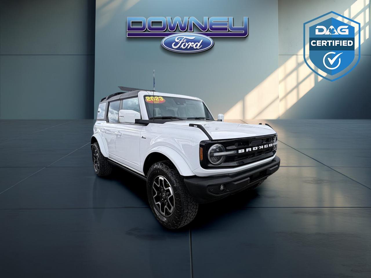 2023 Ford Bronco Outer Banks 4-Door 4x4
Stock #: 52344DB | Price: $50,994

Condition: Pre-Owned | Drivetrain: 4x4

REFINED CAPABILITY & OPEN-AIR FREEDOM
Experience the perfect blend of rugged off-road DNA and sophisticated comfort with the 2023 Ford Bronco Outer Banks. Designed for those who want trail-ready performance without sacrificing premium interior amenities, this 4-door Bronco (Stock #52344DB) is ready for any New Brunswick adventure, from city streets to the untamed backcountry.

TRAIL-READY PERFORMANCE
EcoBoost® Power: Turbocharged 2.7L 6 cylinder engine delivering a robust 330 HP and 415 lb-ft of torque.

Advanced 4x4: 10-speed automatic transmission with Terrain Management System and 6 G.O.A.T. Modes®.

HOSS System: High-Performance Off-Road Stability Suspension (HOSS 1.0) for a smooth ride on any surface.

Towing Ready: Standard Trailer Tow Prep Package with a maximum capacity of 3,500 lbs.

PREMIUM INTERIOR & ADAPTIVE TECH
Open-Air Experience: Easily removable doors and top for true outdoor immersion.

Modern Tech: 8-inch LCD touchscreen featuring SYNC® 4 with Wireless Apple CarPlay® and Android Auto.

Refined Comfort: Heated front seats, dual-zone automatic climate control, and a leather-wrapped steering wheel.

Smart Safety: Ford Co-Pilot360 suite, including BLIS® (Blind Spot Information System) and Lane-Keeping Assist.

WHY BUY FROM DOWNEY FORD SUSSEX?
At Downey Ford, we have been servicing New Brunswick drivers for over 50 years. Our state-of-the-art facility ensures your vehicle is backed by expert technicians and a commitment to quality.

 Visit Us: 1575 Riverview Dr E, Sussex, NB E4E 1A3

 Call Sales: (506) 433-9000