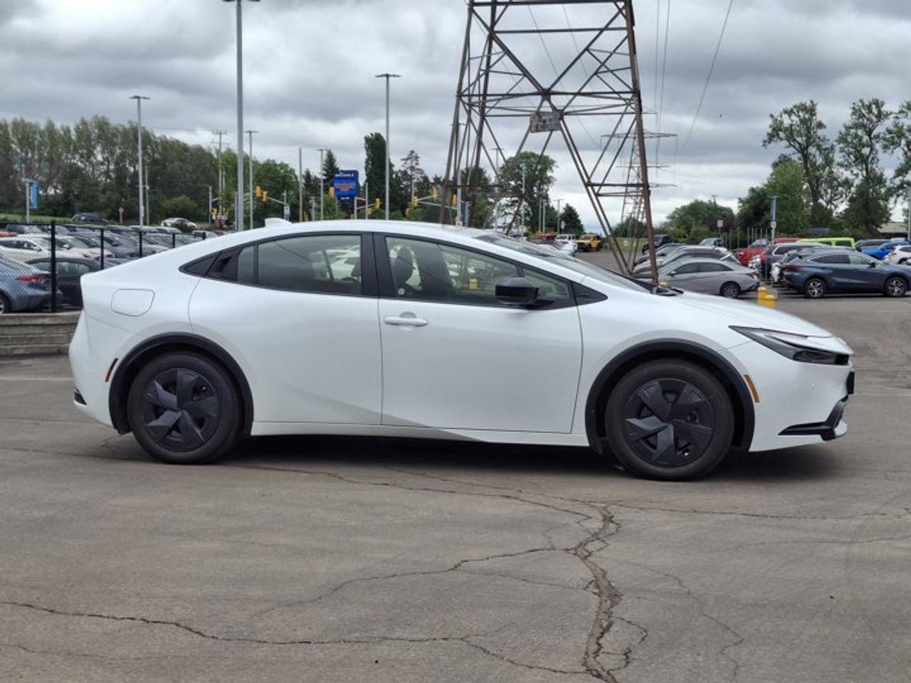 2025 Toyota Prius Plug-In Hybrid SE | Heated Wheel + Seats | Radar Cruise | CarPlay + Android | Rear Camera | and More ! Photo