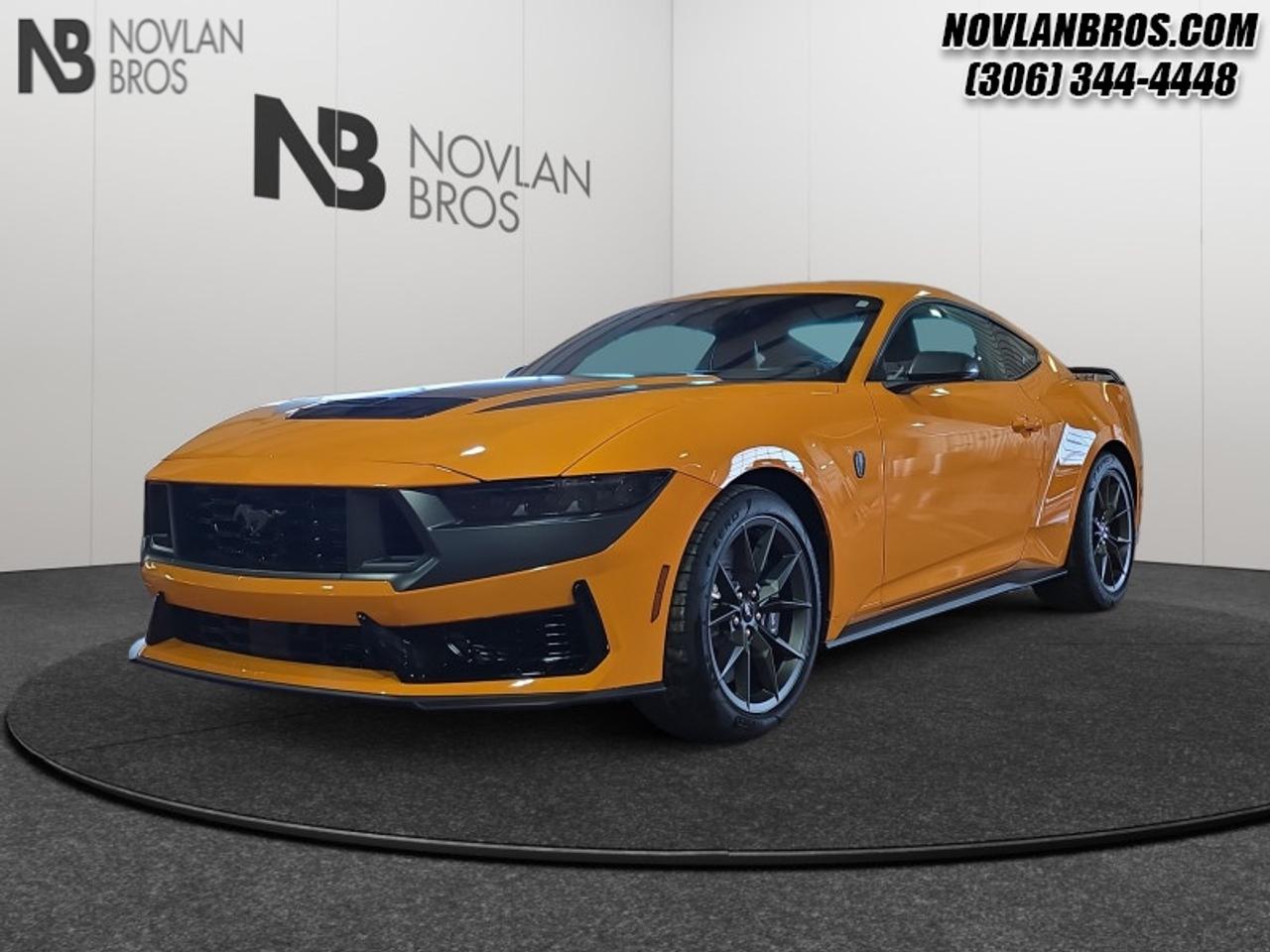 <b>Tech Package!</b><br> <br> <br> <br>Check out our great inventory of new vehicles at Novlan Brothers!<br> <br>This 2026 Mustang debuts with reworked styling and an all-new interior, but with the same undiluted muscle car heritage. <br> <br>From the roar of the engine to its unmistakable style, this Ford Mustang is guaranteed to raise your heart rate and stir your soul. A performance car through and through, this Mustang offers responsive driving dynamics, a comfortable ride and endless smiles by the mile. Its easy to see why the Ford Mustang is still a true American icon.<br> <br>This Orange Fury Metallic Tc coupe has an Automatic transmission and is powered by a 500HP 5.0L 8 Cylinder Engine. <br> <br> Our Mustangs trim level is Dark Horse. The new Dark Horse trim is engineered for ultimate track performance, with MagneRide dampers, sport-tuned suspension, exclusive performance tires, a wing spoiler for downforce. Off the track, you are treated to niceties such as a premium 12-speaker Bang & Olufsen audio system, adaptive cruise control, a leather/suede-wrapped heated steering wheel, voice-activated dual-zone climate control, heated seats, and an immersive 13.2-inch infotainment screen powered by SYNC 4, with integrated navigation, smartphone integration, and FordPass Connect mobile hotspot internet access. Safety features also include blind spot detection, evasive steering assist, lane keeping assist with lane departure warning, and automatic emergency braking. This vehicle has been upgraded with the following features: Tech Package.<br><br> View the original window sticker for this vehicle with this url <b><a href=http://www.windowsticker.forddirect.com/windowsticker.pdf?vin=1FA6P8R05T5501907 target=_blank>http://www.windowsticker.forddirect.com/windowsticker.pdf?vin=1FA6P8R05T5501907</a></b>.<br> <br>To apply right now for financing use this link: <a href=http://novlanbros.com/credit/ target=_blank>http://novlanbros.com/credit/</a><br><br> <br/> Total  rebate of $2000 is reflected in the price.   Incentives expire 2026-06-01.  See dealer for details. <br> <br><br> Come by and check out our fleet of 20+ used cars and trucks and 100+ new cars and trucks for sale in Paradise Hill.  o~o