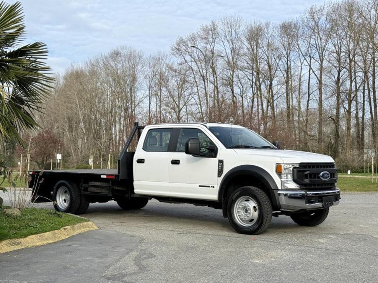Used 2020 Ford F-550 Super Duty XL 4x4 Crew Cab 12-Foot Flat Deck Diesel for sale in Burnaby, BC