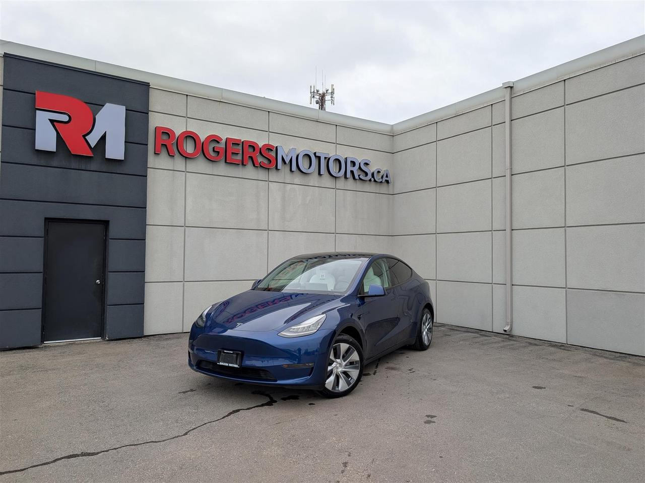 <p>Limited Time Offer: Financing at 5.99% / 6 Months Payment Deferral / $0 Down Payment / Private Viewings Available / Appointments Preferred / Online Purchase and FREE Delivery Available / Curbside Pick Up Available<br style=color: rgba(0, 0, 0, 0.87);text-align: left;/><br style=color: rgba(0, 0, 0, 0.87);text-align: left;/><br style=color: rgba(0, 0, 0, 0.87);text-align: left;/>WHITE INTERIOR / LONG RANGE AWD / NAVIGATION / BLINDSPOT ASSIST / FRONT COLLISION WARNING / LANE ASSIST / 360 CAMERA / PANORAMIC ROOF / BLUETOOTH / HEATED SEATS & STEERING / SMART KEY / And More...<br style=color: rgba(0, 0, 0, 0.87);text-align: left;/><br style=color: rgba(0, 0, 0, 0.87);text-align: left;/><br style=color: rgba(0, 0, 0, 0.87);text-align: left;/>While walk-ins are welcome, we encourage scheduling appointments for a smoother and more personalized experience.<br style=color: rgba(0, 0, 0, 0.87);text-align: left;/><br style=color: rgba(0, 0, 0, 0.87);text-align: left;/><br style=color: rgba(0, 0, 0, 0.87);text-align: left;/>This 2021 Tesla Model Y is equipped with luxury features including Navigation, Sunroof, Leather, Power Windows, Power Locks, Heated Seats, Bluetooth Connectivity, Premium Sound System, and much more. Meticulously maintained, both the exterior and interior are in great condition. Prices are subject to taxes, certification, and licensing. Trade-ins are welcomed.<br style=color: rgba(0, 0, 0, 0.87);text-align: left;/><br style=color: rgba(0, 0, 0, 0.87);text-align: left;/><br style=color: rgba(0, 0, 0, 0.87);text-align: left;/>Financing Available For All Credit Types Starting at 5.99% O.A.C. Up To 6 Months Payment Deferral Available. Our financing options cater to individuals with good, bad, or no credit history. Additionally, we offer up to 6 months with no payments and completely open loans with no early repayment fees. Our streamlined credit application process ensures quick approvals. Same-day delivery options are also accessible.<br style=color: rgba(0, 0, 0, 0.87);text-align: left;/><br style=color: rgba(0, 0, 0, 0.87);text-align: left;/><br style=color: rgba(0, 0, 0, 0.87);text-align: left;/>Our state-of-the-art 10,000 square foot auto service center is staffed with licensed mechanics and is open to the public. From routine maintenance like oil changes and brake services to major repairs such as engine replacements, our service center caters to all automotive needs. Loaner vehicles are available for extended service requirements.<br style=color: rgba(0, 0, 0, 0.87);text-align: left;/><br style=color: rgba(0, 0, 0, 0.87);text-align: left;/><br style=color: rgba(0, 0, 0, 0.87);text-align: left;/>We are Oakvilles premier destination for rust proofing services. Schedule an appointment to protect your vehicle from corrosion.<br style=color: rgba(0, 0, 0, 0.87);text-align: left;/><br style=color: rgba(0, 0, 0, 0.87);text-align: left;/><br style=color: rgba(0, 0, 0, 0.87);text-align: left;/>Experience Excellence at Rogers Motors. Rogers Motors proudly stands as Oakvilles largest used car dealership, renowned for providing top-quality used vehicles including cars, trucks, SUVs, and minivans. Family-owned and operated since 2004, with over 10,000 vehicles sold, we are committed to delivering exceptional service.<br style=color: rgba(0, 0, 0, 0.87);text-align: left;/><br style=color: rgba(0, 0, 0, 0.87);text-align: left;/><br style=color: rgba(0, 0, 0, 0.87);text-align: left;/>At Rogers Motors, we prioritize customer satisfaction above all else. With a focus on love, honesty, integrity, and transparency, we strive to ensure that every guest leaves our dealership happier than when they arrived. With an average rating of 4.9/5 from over 1000 online reviews, we invite you to experience car shopping and service the way it should be.<br style=color: rgba(0, 0, 0, 0.87);text-align: left;/><br style=color: rgba(0, 0, 0, 0.87);text-align: left;/><br style=color: rgba(0, 0, 0, 0.87);text-align: left;/>Rogers Motors. Driving Happiness.<br style=color: rgba(0, 0, 0, 0.87);text-align: left;/>Visit our website to see all our current inventory.<br/></p>
