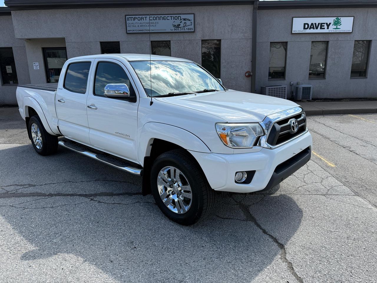 2014 Toyota Tacoma AWD V6 LIMITED,NAV,LEATHER,SUNROOF,MINT,CERTIFIED! Photo