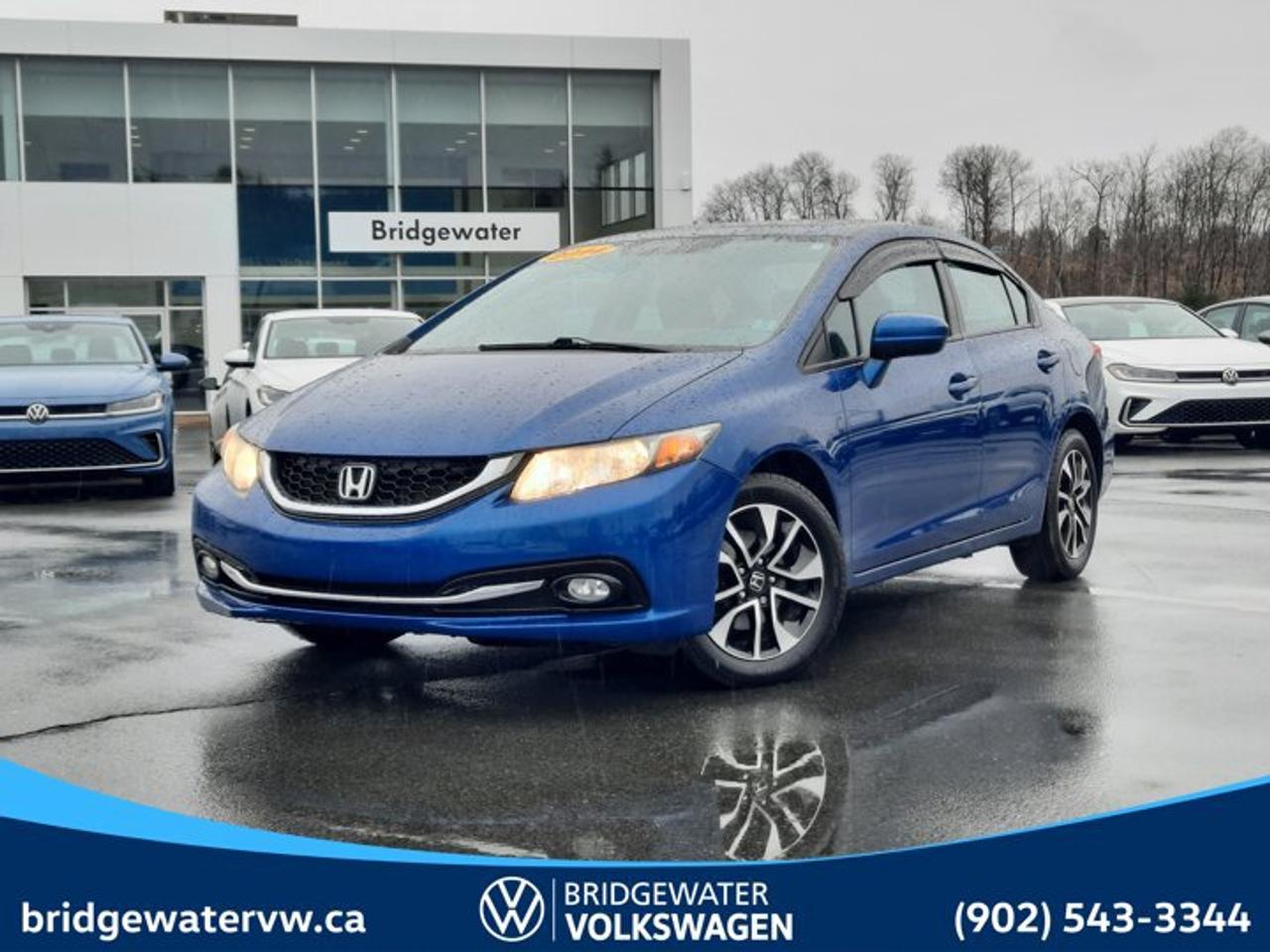 New Price! Recent Arrival! 2014 Honda Civic EX| New MVI Certified.This vehicle has passed Motor Vehicle Inspection (MVI) and is road-ready for its next owner. It is being sold without warranty and has not undergone a manufacturer or dealership certification program. Reconditioning & Inspection Includes: Provincial Motor Vehicle Inspection (MVI) Safety-related repairs completed as required to meet inspection standards Basic mechanical and safety checks Final road test Any MVI-related concerns must be reported within the applicable time frame. Any inspection-related concerns must be reviewed and addressed by the original selling dealer.CARFAX Canada No Reported AccidentsDyno Blue Pearl FWD CVT 1.8L I4 SOHC 16V i-VTEC Black Cloth, 4-Wheel Disc Brakes, 6 Speakers, ABS brakes, Air Conditioning, AM/FM radio, Automatic temperature control, Brake assist, Bumpers: body-colour, CD player, Delay-off headlights, Driver door bin, Driver vanity mirror, Dual front impact airbags, Dual front side impact airbags, Electronic Stability Control, Exterior Parking Camera Rear, Four wheel independent suspension, Front anti-roll bar, Front reading lights, Heated door mirrors, Illuminated entry, Occupant sensing airbag, Outside temperature display, Overhead airbag, Panic alarm, Passenger vanity mirror, Power door mirrors, Power moonroof, Power steering, Power windows, Radio data system, Radio: AM/FM/CD/MP3/WMA Audio System w/6 Speakers, Rear anti-roll bar, Rear window defroster, Remote keyless entry, Security system, Speed control, Speed-sensing steering, Steering wheel mounted audio controls, Traction control.