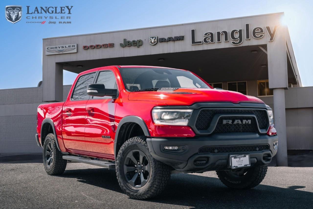 <p><strong>2022 RAM 1500 Rebel 4x4 Crew Cab 5'7" Box HEMI</strong></p><p>The 2022 RAM 1500 Rebel is a rugged off-road specialist that pairs the legendary 5.7L HEMI V8 with factory-installed hardware like Bilstein shocks and an electronic locking rear differential.</p><ul><li><p><strong>Engine</strong>: 5.7L HEMI VVT V8 with MDS (395 hp, 410 lb-ft torque)</p></li><li><p><strong>Drivetrain</strong>: 4x4 with 8-speed automatic transmission and 3.92 rear axle ratio</p></li><li><p><strong>Efficiency</strong>: 15.6 L/100 km City / 10.7 L/100 km Highway</p></li><li><p><strong>Max Towing</strong>: Up to 5,121 kg (11,290 lbs)</p></li><li><p><strong>Technology</strong>: 8.4-inch Uconnect 4 touchscreen and 7-inch digital cluster</p></li><li><p><strong>Key Features</strong>: Bilstein performance shocks, 33-inch all-terrain tires, and skid plates</p></li></ul><p>Come book a test drive at Langley Chrysler, conveniently located in Langley, British Columbia.</p>

<p>*All prices plus applicable taxes, applicable environmental recovery charges, documentation of $599 and full tank of fuel surcharge of $76 if a full tank is chosen. <br />Other protection items available that are not included in the above price:<br />Tire & Rim Protection and Key fob insurance starting from $599<br />Service contracts (extended warranties) for coverage up to 7 years and 200,000 kms starting from $599<br />Custom vehicle accessory packages, mudflaps and deflectors, tire and rim packages, lift kits, exhaust kits and tonneau covers, canopies and much more that can be added to your payment at time of purchase<br />Undercoating, rust modules, and full protection packages starting from $199<br />Financing Fee of $500 when applicable<br />Flexible life, disability and critical illness insurances to protect portions of or the entire length of vehicle loan</p>