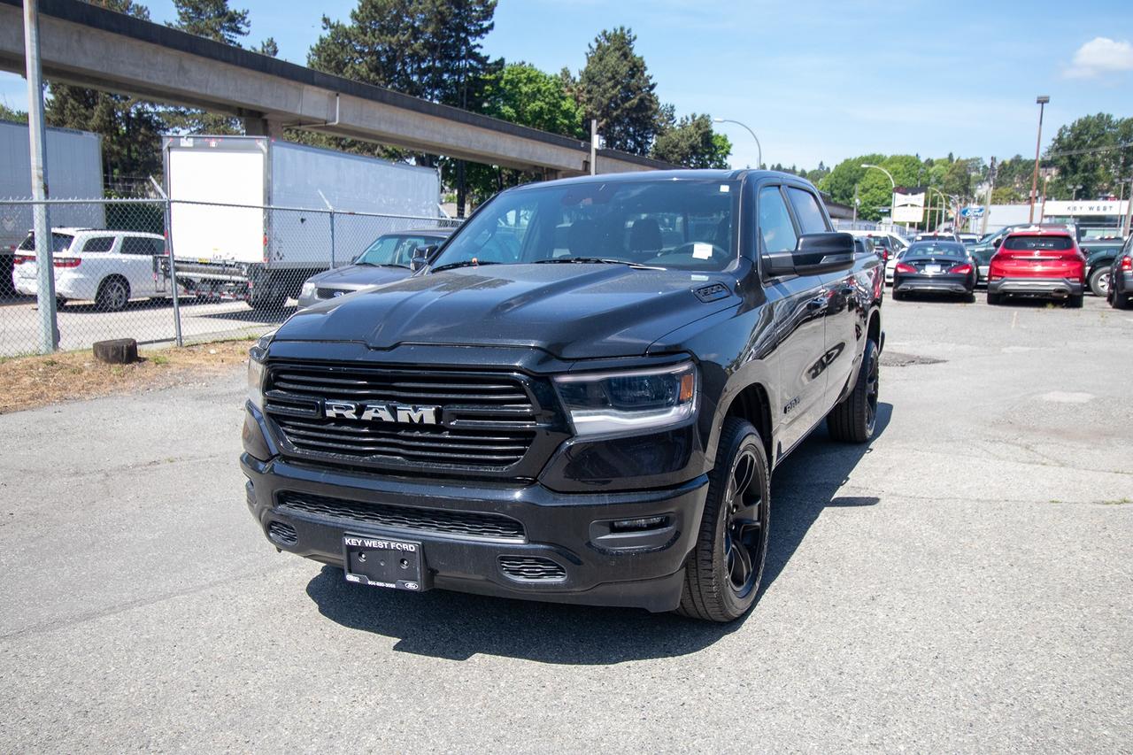 <p>Experience the ultimate in rugged capability and refined comfort with this pre-owned 2023 RAM 1500 Sport 4x4 Crew Cab, now available at Key West Ford. Dressed in a sleek, timeless black exterior, this pickup truck is ready to tackle any adventure, from hauling heavy loads on the job site to embarking on weekend getaways. With only 31,635 kilometers on the odometer, this RAM 1500 represents exceptional value, offering you the latest in truck technology and design without compromising on performance or style.</p><p>Step inside the spacious Crew Cab and discover a premium interior designed for both driver and passengers. The automatic transmission and robust 4-wheel drive system ensure a smooth and confident ride no matter the road conditions, while the 57 box provides ample space for all your gear. This RAM 1500 Sport is more than just a truck; its a statement of power, versatility, and sophisticated engineering, ready to elevate your driving experience.</p><p>Here are 5 features that truly shine on this 2023 RAM 1500 Sport:</p><ul><li><strong>Sport Trim Excellence:</strong> The Sport trim level is designed for those who demand both aggressive styling and enhanced performance, giving you a truck that looks as capable as it is.</li><li><strong>Legendary 4x4 Capability:</strong> Conquer any terrain with confidence thanks to the robust 4-wheel drive system, perfect for Canadian winters and off-road excursions.</li><li><strong>Spacious Crew Cab Comfort:</strong> Enjoy generous legroom and seating for your entire crew in the versatile Crew Cab configuration, making every journey a pleasure.</li><li><strong>Powerful and Reliable Gasoline Engine:</strong> Experience exhilarating performance and dependable power that&rsquo;s ready for work or play.</li><li><strong>Sleek Black Exterior Finish:</strong> Make a bold impression with the striking and sophisticated black paint that exudes a premium look and feel.</li></ul><p><strong><em>Powered by AutoIntelligence&trade;</em></strong></p><p>Vehicle information has been generated using artificial intelligence and is provided for informational purposes only. While efforts are made to ensure accuracy, please confirm all details directly with the dealer.</p><p>Experience peace of mind with our Buy With Confidence program! This vehicle comes with a comprehensive mechanical and safety inspection, Carfax report, and full disclosure. We are committed to transparent pricing. The advertised price excludes fees: $699 Documentation, $349 Registration/Insurance Transfer, $695 Finance Administration Fee (if applicable), and taxes. As BCs #1 Volume Dealer and #1 for Customer Experience on DealerRater, we prioritize your satisfaction. See Key West Ford for complete details. Book your test drive today!&nbsp; Dealer #7485</p>