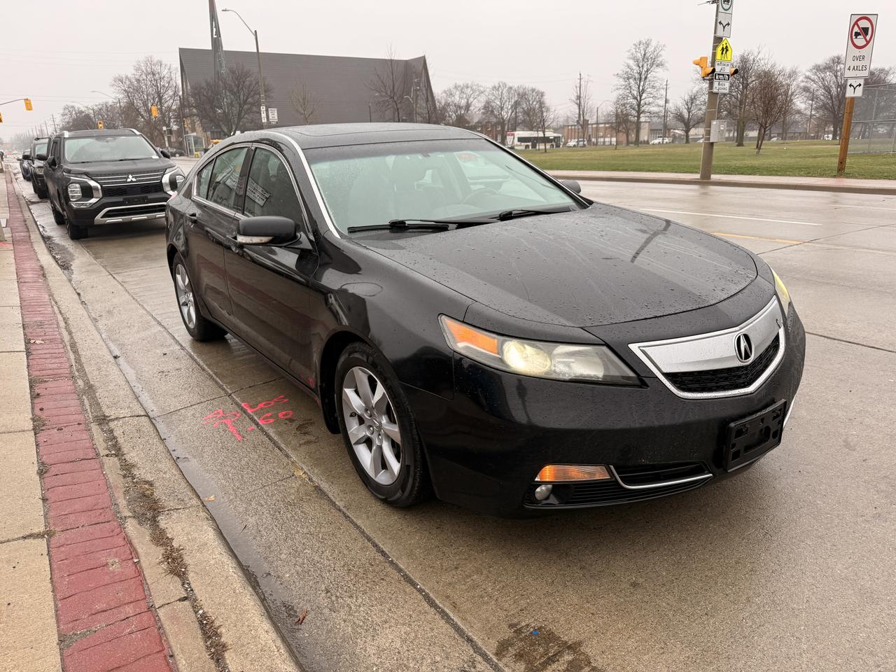 2012 Acura TL 4dr Sdn Auto 2WD w/Tech Pkg Photo