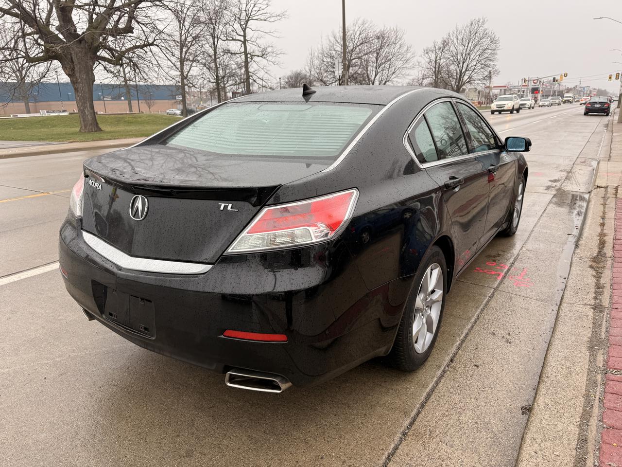 2012 Acura TL 4dr Sdn Auto 2WD w/Tech Pkg Photo