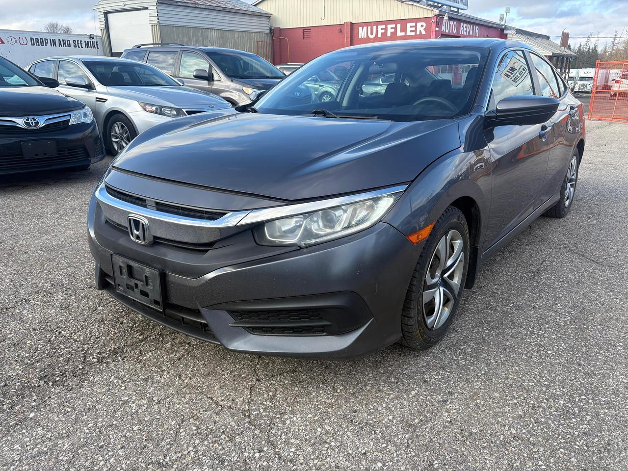 <p data-path-to-node=0>Financing Available | All Credit Types Welcome FREE 2-Year Engine & Transmission Warranty (Unlimited KMs included!) OMVIC & UCDA Certified Dealer &mdash; Verma Motors Inc.</p><p data-path-to-node=1><strong data-path-to-node=1 data-index-in-node=0>Price: $13,500 CERTIFIED + HST</strong></p><p data-path-to-node=2><strong data-path-to-node=2 data-index-in-node=0>2016 Honda Civic Sedan LX</strong></p><p data-path-to-node=3><em data-path-to-node=3 data-index-in-node=0>A reliable, fuel-efficient, and comfortable daily driver.</em></p><p data-path-to-node=4><strong data-path-to-node=4 data-index-in-node=0>Top Features:</strong></p><ul data-path-to-node=5><li><p data-path-to-node=5,0,0><strong data-path-to-node=5,0,0 data-index-in-node=0>Extras:</strong> Comes with Two Sets of Tires (Both on Rims!).</p></li><li><p data-path-to-node=5,1,0><strong data-path-to-node=5,1,0 data-index-in-node=0>Engine:</strong> 2.0L 4-Cylinder.</p></li><li><p data-path-to-node=5,2,0><strong data-path-to-node=5,2,0 data-index-in-node=0>Tech:</strong> Backup Camera & Bluetooth Connectivity.</p></li><li><p data-path-to-node=5,3,0><strong data-path-to-node=5,3,0 data-index-in-node=0>Comfort:</strong> Automatic Climate Control, Power Windows & Locks.</p></li><li><p data-path-to-node=5,4,0><strong data-path-to-node=5,4,0 data-index-in-node=0>Interior:</strong> Premium Cloth Seating.</p></li></ul><p data-path-to-node=6><strong data-path-to-node=6 data-index-in-node=0>Status:</strong></p><ul data-path-to-node=7><li><p data-path-to-node=7,0,0>148,981 Kilometers</p></li><li><p data-path-to-node=7,1,0>Well-Maintained</p></li><li><p data-path-to-node=7,2,0>Very Clean Interior & Exterior</p></li></ul><p data-path-to-node=8><strong data-path-to-node=8 data-index-in-node=0>Strictly Viewing by Appointment Only (Please book an appointment before coming; no walk-ins).</strong></p><p data-path-to-node=9><strong data-path-to-node=9 data-index-in-node=0>Call or Text Kapil:</strong> 437-766-1844 <strong data-path-to-node=9 data-index-in-node=33>Location:</strong> 9074 Wellington Rd 124, Hillsburgh, ON N0B 1Z0</p>