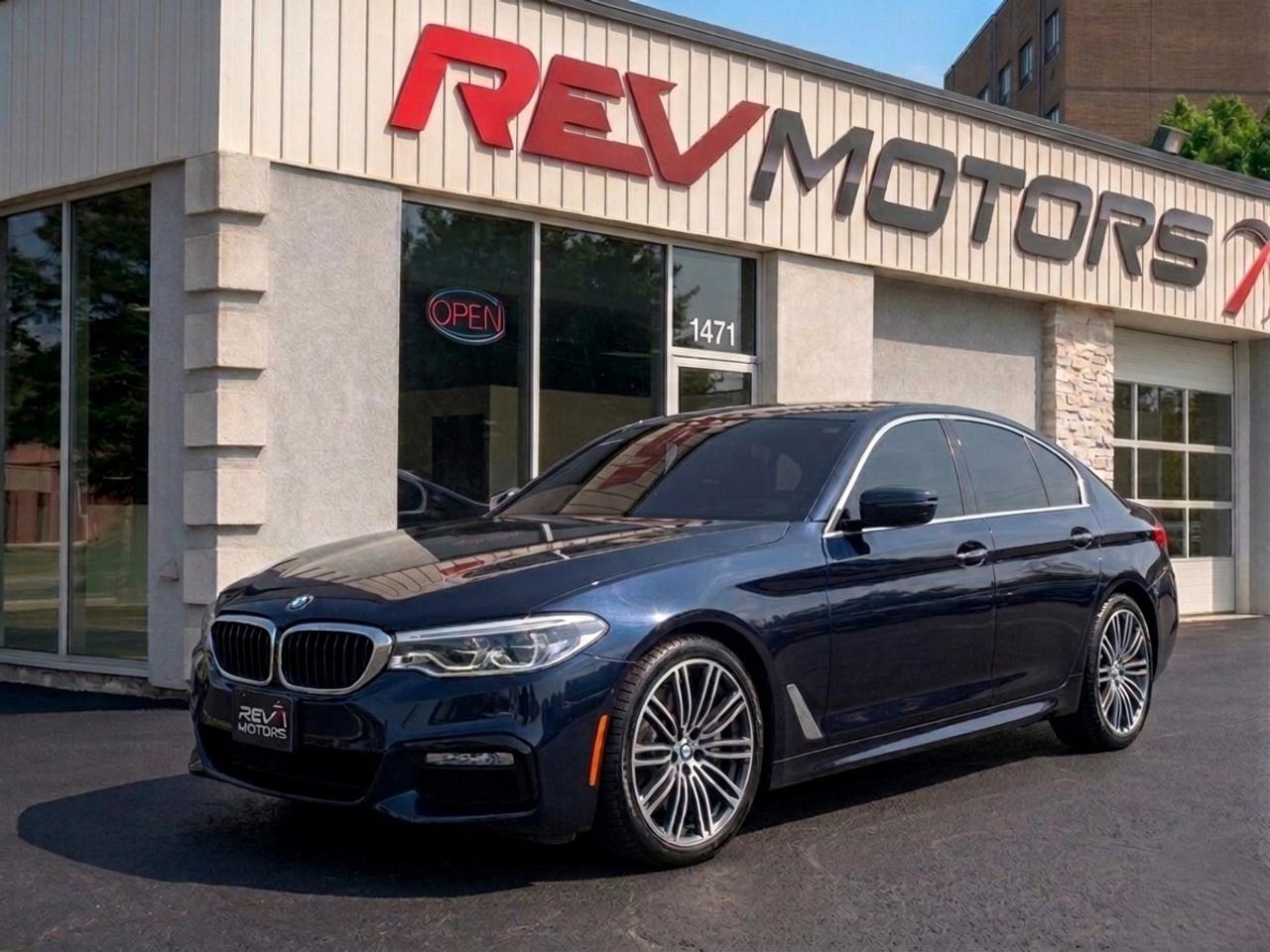 2018 BMW 530i xDrive | Head-Up Display | Heated Seats and Steering | Wireless Charging | More Photos Coming Soon<br/> <br/> Black Exterior | Black Leather Interior | Alloy Wheels | Keyless Entry | Front Power Seats | Power Trunk | Rear Climate Control | Front and Rear Heated Seats | Cruise Control | Heated Steering Wheel | Bluetooth Connection | Voice Control | Navigation | Fold-In Power Mirrors | Harman/Kardon Speakers | Drive Mode Select | Traction Control | Parking Aid | Sunroof | Push Button Start | Rearview Camera | Wireless Charging Station | Ambient Lighting | Head-Up Display and much more. <br/> <br/> <br/> Discover Elegance and Innovation with the 2018 BMW 530i xDrive! Experience the pinnacle of luxury and performance with the 2018 BMW 530i xDrive. This sophisticated sedan combines advanced technology, sleek design, and exceptional driving dynamics to provide an unforgettable journey every time you get behind the wheel. Its more than just a car; its an extension of your refined taste and desire for excellence. Ready to elevate your driving experience? <br/> <br/> <br/> Key features: <br/> Engine: 2.0L TwinPower Turbo inline-4 engine delivering 248 horsepower and 258 lb-ft of torque, ensuring a powerful yet efficient drive. <br/> <br/> <br/> Drivetrain: xDrive intelligent all-wheel drive system offers superior traction and stability, adapting to various driving conditions. <br/> <br/> <br/> Interior Comfort: Heated front seats and a heated steering wheel provide warmth and comfort during colder months, enhancing your driving experience. <br/> <br/> <br/> Head-Up Display: Full-color Head-Up Display projects vital driving information directly onto the windshield, keeping your eyes focused on the road. <br/> <br/> <br/> Wireless Charging: Stay connected and powered up with the wireless charging pad, ensuring your devices are always ready to go without the hassle of cords. <br/> <br/> <br/> Technology: 10.2-inch high-resolution touchscreen display with BMW iDrive 6.0, featuring navigation, Apple CarPlay, and advanced voice control for seamless connectivity and entertainment. <br/> <br/> <br/> Safety: Comprehensive safety features including Active Blind Spot Detection, Lane Departure Warning, and Frontal Collision Warning with City Collision Mitigation. <br/> <br/> <br/> This Vehicle Has Travelled 131,270 Kms. <br/> <br/> <br/> Design: Elegant exterior design with LED headlights, a sleek kidney grille, and aerodynamic lines that exude sophistication and style. <br/> *** NO additional fees except for taxes and licensing! *** <br/> <br/> <br/> *** 100-point inspection on all our vehicles & always detailed inside and out *** <br/> <br/> <br/> RevMotors is at your service to ensure you find the right car for YOU. Even if we do not have it in our inventory, we are more than happy to find you the vehicle that you are looking for. Give us a call at 613-791-3000 or visit us online at www.revmotors.ca <br/> <br/> <br/> Ça nous donnera du plaisir de vous servir en Français aussi! <br/> <br/> <br/> CERTIFICATION * This Vehicle is being Sold - AS IS - and is considered not drivable and not certified. Certification is available for $799. <br/> FINANCING AVAILABLE * RevMotors offers competitive finance rates through many of the major banks. Should you feel like youve had credit issues in the past, we have various financing solutions to get you on the road. We accept No Credit - New Credit - Bad Credit - Bankruptcy - Students and more!! Please keep in mind the default loan structure found on the vehicle page is a template. The exact rate and terms that a vehicle qualifies for may differ. All quotes are subject to lender approval. <br/> EXTENDED WARRANTY * For your peace of mind, if one of our used vehicles is no longer covered under the manufacturer’s warranty, RevMotors will provide you with a 6 month / 6000KMS Limited Powertrain Warranty. You always have the options to upgrade to more comprehensive coverage as well. Well be more than happy to review the options and chose the coverage thats right for you! <br/> TRADES * Do you have a Trade-in? We offer competitive trade in offers for your current vehicle! <br/> SHIPPING * We can ship anywhere across Canada. Give us a call for a quote and we will be happy to help! <br/> <br/> <br/> Buy with confidence knowing that we always have your best interests in mind! <br/>