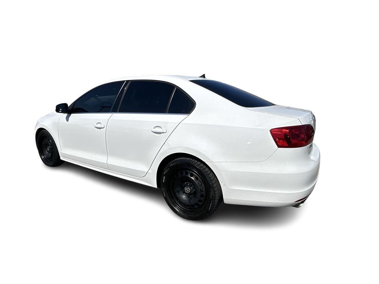 2014 Volkswagen Jetta Highline Sunroof   Leather Int   Nav   2 Tire Sets Photo
