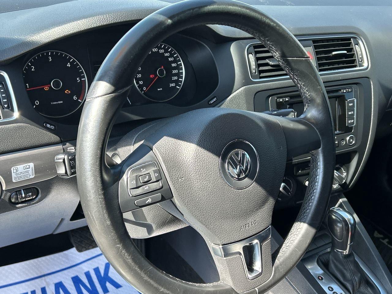2014 Volkswagen Jetta Highline Sunroof   Leather Int   Nav   2 Tire Sets Photo