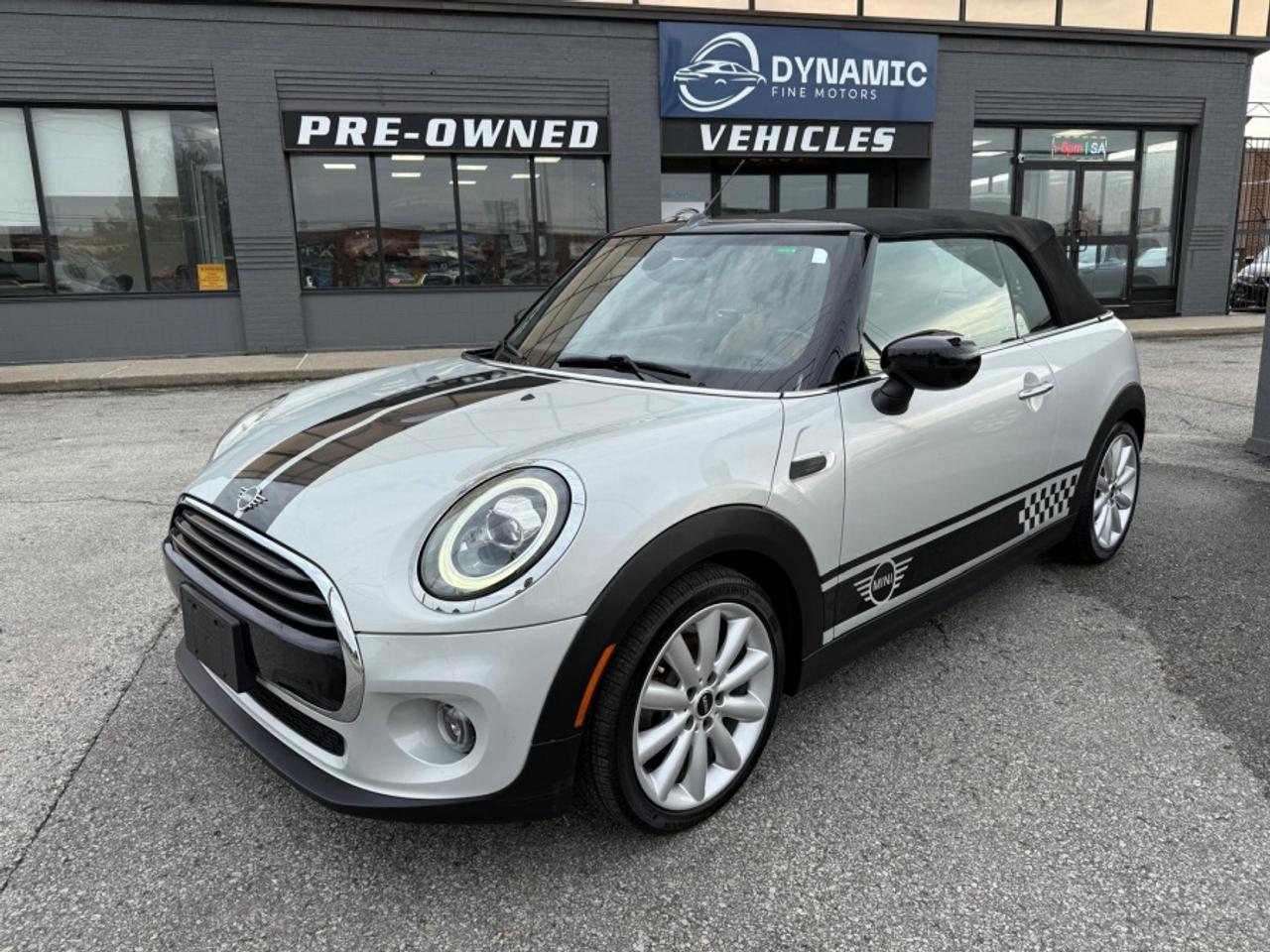 VERY ATTRACTIVE GREAT COLOUR COMBO 2020 Mini COOPER CONVERTIBLE ** AUTOMATIC * SILVER WITH BLACK POWER RETRACTABLE TOP * LEATHER HEATED SEATS * NAVIGATION * REVERSE CAMERA * KEY-LEAS ENTRY *  PARKING SENSORS *  ALLOY WHEELS and more.<br><br>** ONLY 52,000 KILOMETERS **<br><br><br>Tax and Licensing Fees are EXTRA!<br>This vehicle can be certified for an additional $799.  <br>If not Certified, then as per OMVIC Regulations the vehicle is deemed un-fit, not drivable and not Certified.<br><br>5161 Steeles Ave W, North York<br>Open Monday-Saturday<br>dynamicfinemotors.ca<br>Call or text 437-561-2890