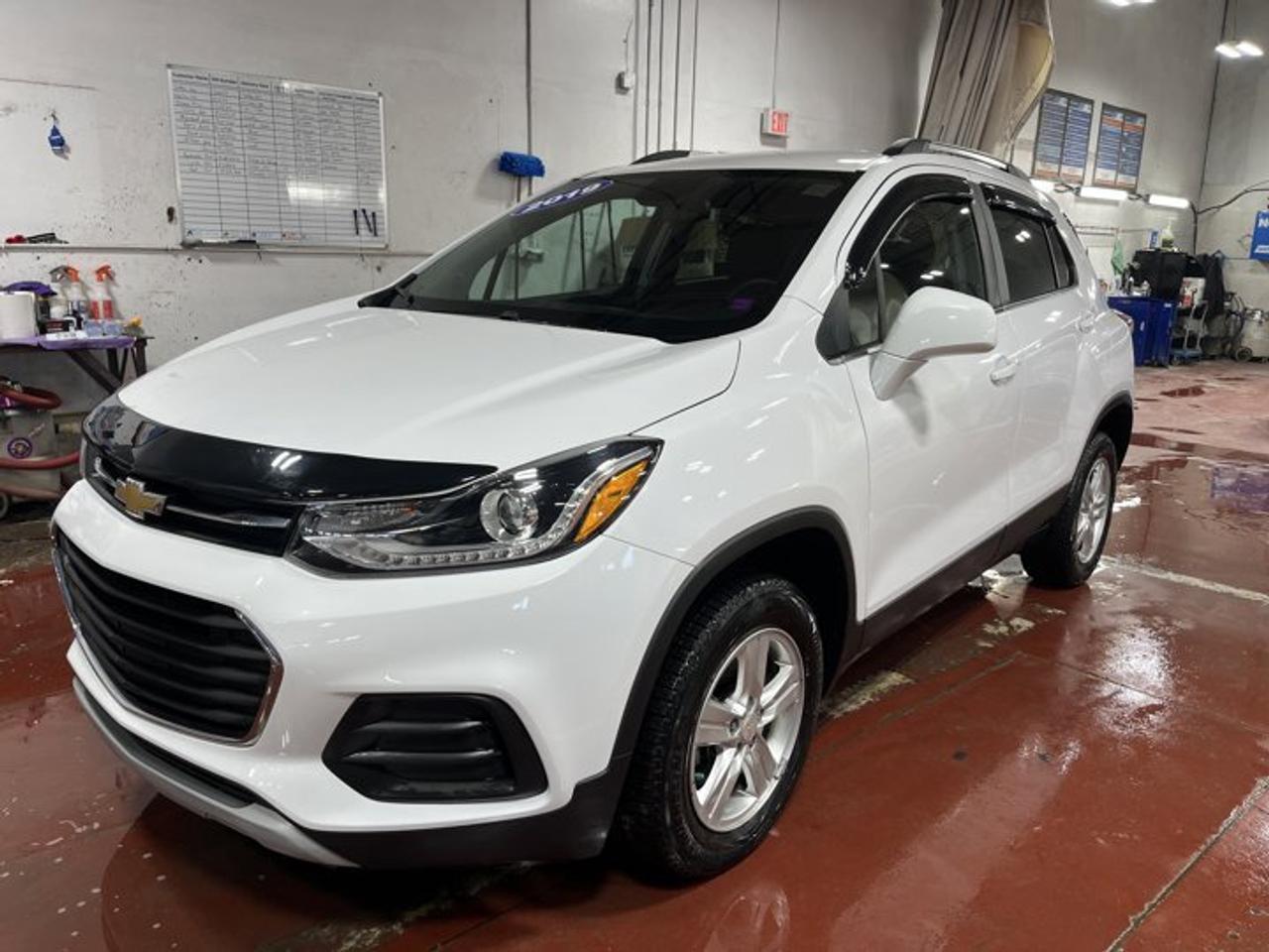 Recent Arrival!Summit White 2019 Chevrolet Trax LT AWD 6-Speed Automatic ECOTEC 1.4L I4 SMPI DOHC Turbocharged VVT16 Aluminum Wheels, 2 USB Ports w/Auxiliary Input Jack, 2-Way Manual Front Passenger Seat Adjuster, 3.53 Axle Ratio, 4-Way Manual Driver Seat Adjuster, 4-Wheel Disc Brakes, 6 Speakers, 6-Speaker Audio System Feature, ABS brakes, Air Conditioning, Alloy wheels, AM/FM radio: SiriusXM, Apple CarPlay/Android Auto, Brake assist, Bumpers: body-colour, Compass, Delay-off headlights, Deluxe Cloth Seat Trim, Driver door bin, Driver vanity mirror, Drivers Seat Mounted Armrest, Dual front impact airbags, Dual front side impact airbags, Electronic Stability Control, Emergency communication system: OnStar and Chevrolet connected services capable, Exterior Parking Camera Rear, Front anti-roll bar, Front Bucket Seats, Front Bucket Seats w/Driver Power Lumbar, Front License Plate Bracket BC/MB/NB/ON, Front reading lights, Front wheel independent suspension, Fully automatic headlights, Heated door mirrors, Illuminated entry, Knee airbag, Low tire pressure warning, Occupant sensing airbag, Outside temperature display, Overhead airbag, Panic alarm, Passenger door bin, Passenger vanity mirror, Power door mirrors, Power steering, Power windows, Preferred Equipment Group 1LT, Premium audio system: Chevrolet MyLink, Radio data system, Radio: Chevrolet Infotainment 3 System w/AM/FM, Rear side impact airbag, Rear window defroster, Rear window wiper, Remote keyless entry, Roof rack: rails only, Security system, SiriusXM, Speed control, Speed-sensing steering, Split folding rear seat, Spoiler, Steering wheel mounted audio controls, Tachometer, Telescoping steering wheel, Tilt steering wheel, Traction control, Trip computer, Variably intermittent wipers.Certification Program Details: 80 Point Inspection Fresh Oil Change Full Vehicle Detail Full tank of Gas 2 Years Fresh MVI Brake through InspectionAt Steele GMC Buick Fredericton, were proud to be your Used Car Mega Center serving drivers all across Atlantic Canada from Fredericton, Oromocto, New Maryland, Woodstock, Saint John, and Moncton in New Brunswick, to Nova Scotia, Prince Edward Island, and Newfoundland. Our inventory features all makes and models of used cars, trucks, SUVs, and vans, giving you the best selection in the region. Whether you need a fuel-efficient sedan, a family SUV, or a rugged pickup, youll find it right here at Steele GMC Buick Fredericton. With our Market Value Pricing, every vehicle is priced based on real-time market conditions, ensuring you get the best possible deal without the hassle of negotiating. We keep pricing transparent and competitive so you can shop with total confidence. No matter your credit situation good, bad, or no credit at all youre approved. Our finance experts work with lenders across Atlantic Canada to find the best terms for your budget, including second-chance financing, newcomer programs, and credit rebuilding solutions. As part of Steele Auto Group, Atlantic Canadas most diversified automotive group with 47 dealerships representing 27 brands, we offer unmatched selection, buying power, and customer support. That means if the vehicle you want isnt on our Fredericton lot, we can source it quickly from our massive dealer network across the Maritimes. When it comes to used vehicles, Steele GMC Buick Fredericton is the destination for drivers all across Atlantic Canada delivering market value pricing, every make and model, and guaranteed credit approval so you can get on the road with confidence.Steele Auto Group is the most diversified group of automobile dealerships in Atlantic Canada, with 47 dealerships selling 27 brands and an employee base of well over 2300.
