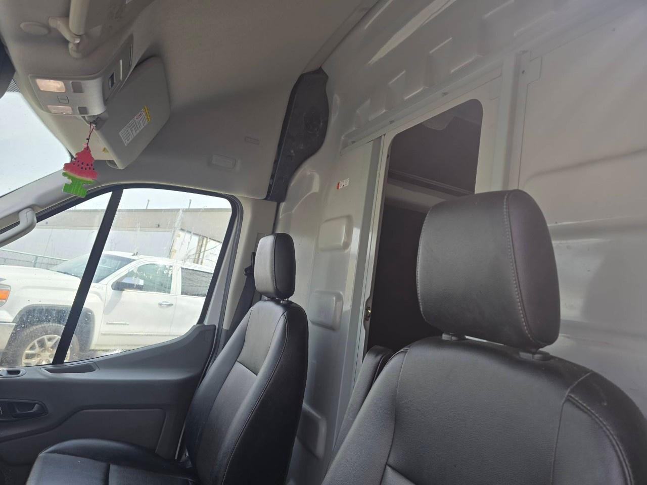 2023 Ford Transit Cargo Van T-250 148" EL Hi Rf 9070 GVWR RWD Photo