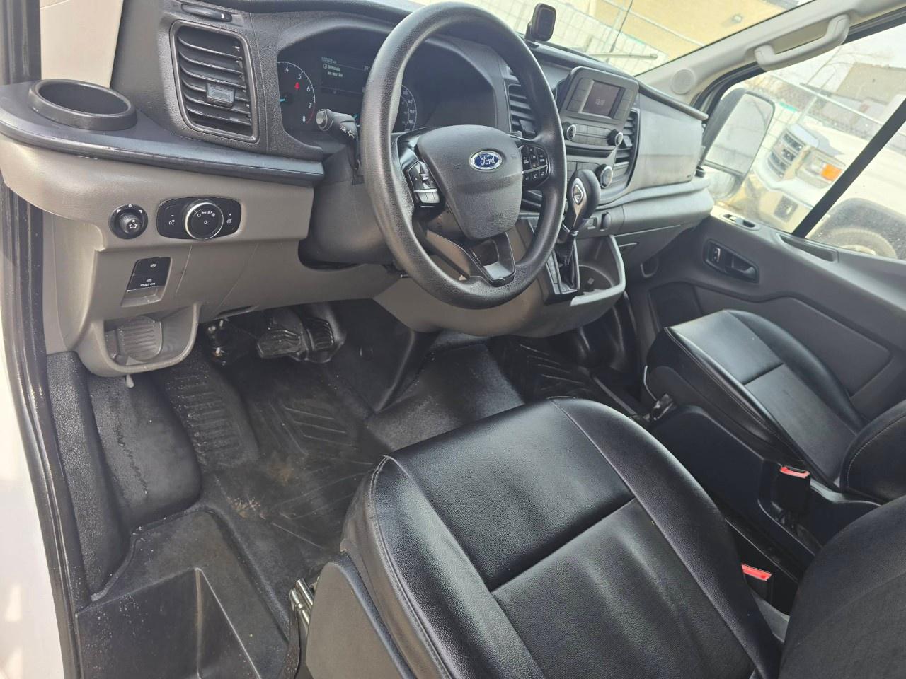 2023 Ford Transit Cargo Van T-250 148" EL Hi Rf 9070 GVWR RWD Photo