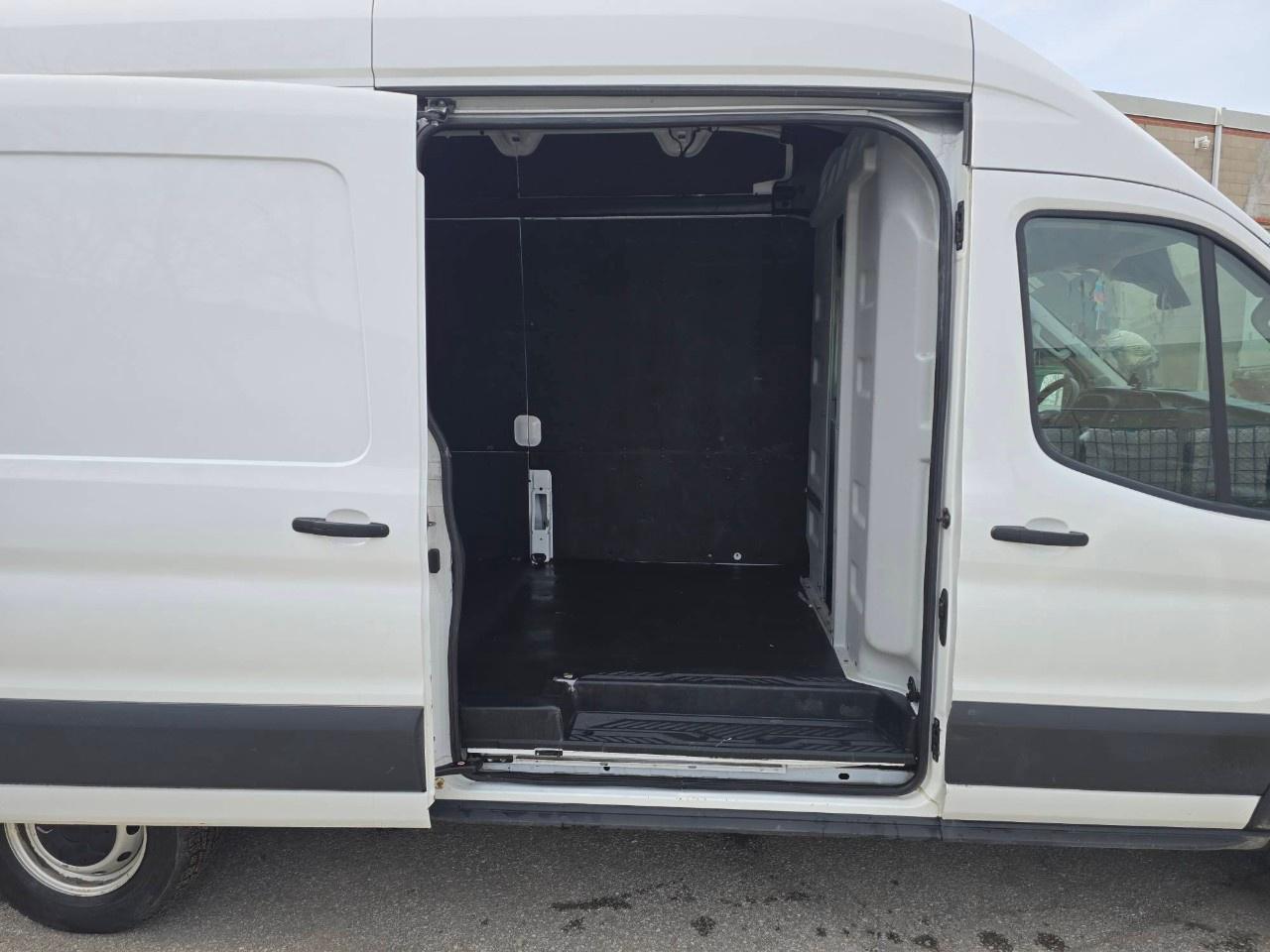2023 Ford Transit Cargo Van T-250 148" EL Hi Rf 9070 GVWR RWD Photo