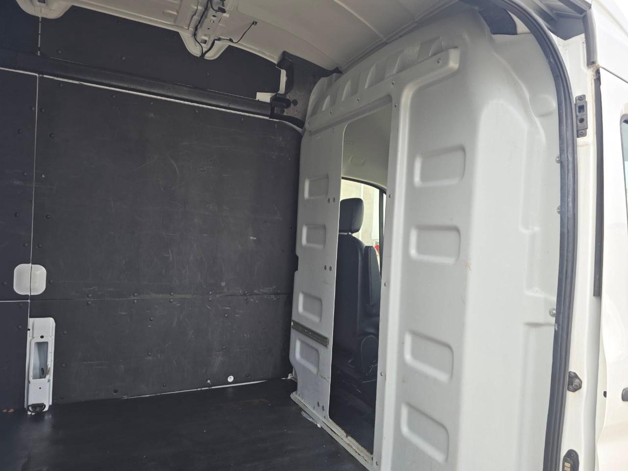 2023 Ford Transit Cargo Van T-250 148" EL Hi Rf 9070 GVWR RWD Photo