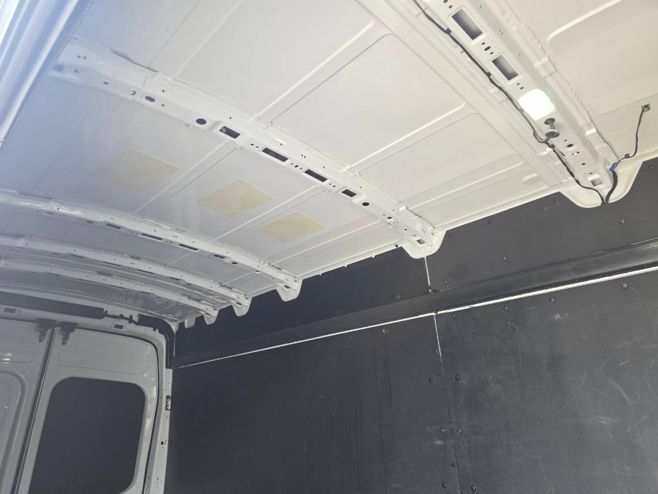 2023 Ford Transit Cargo Van T-250 148" EL Hi Rf 9070 GVWR RWD Photo