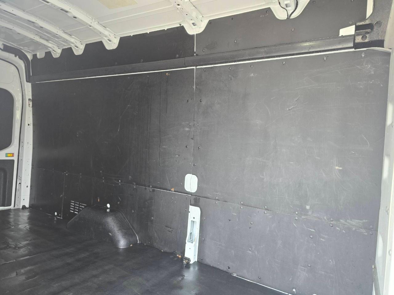 2023 Ford Transit Cargo Van T-250 148" EL Hi Rf 9070 GVWR RWD Photo