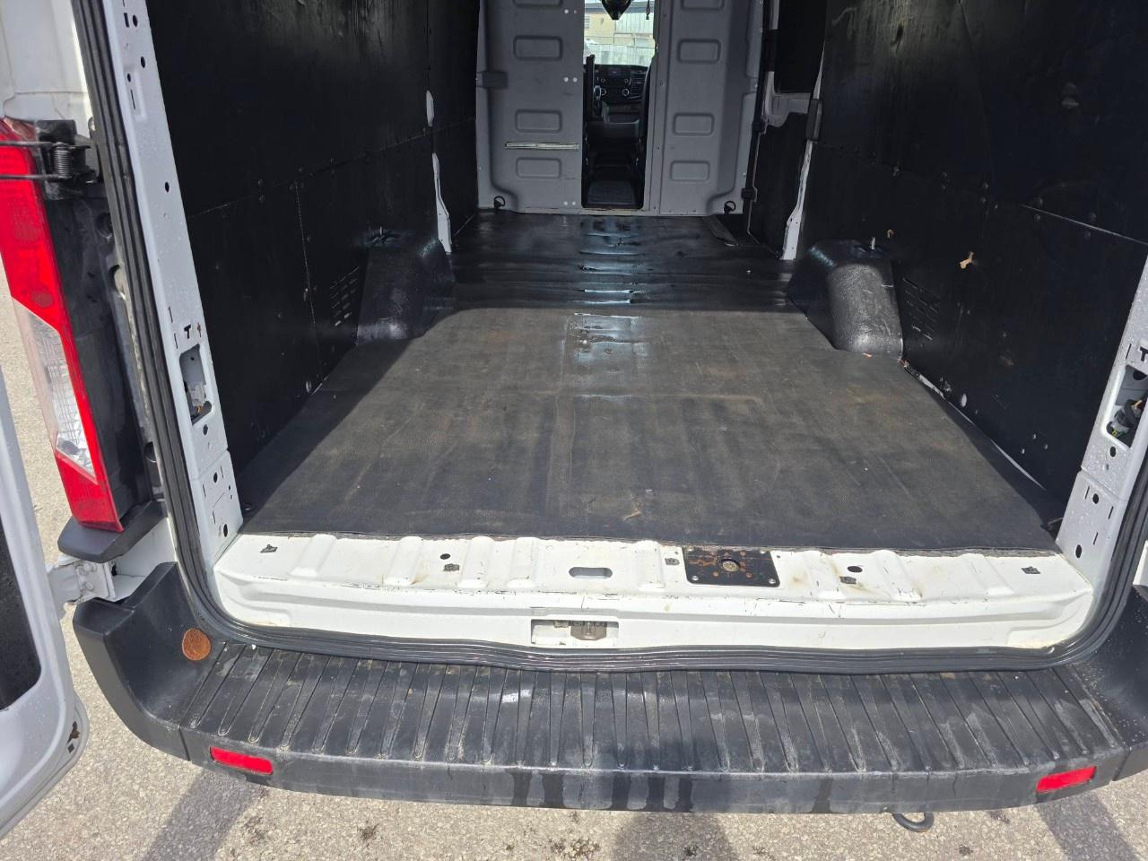 2023 Ford Transit Cargo Van T-250 148" EL Hi Rf 9070 GVWR RWD Photo