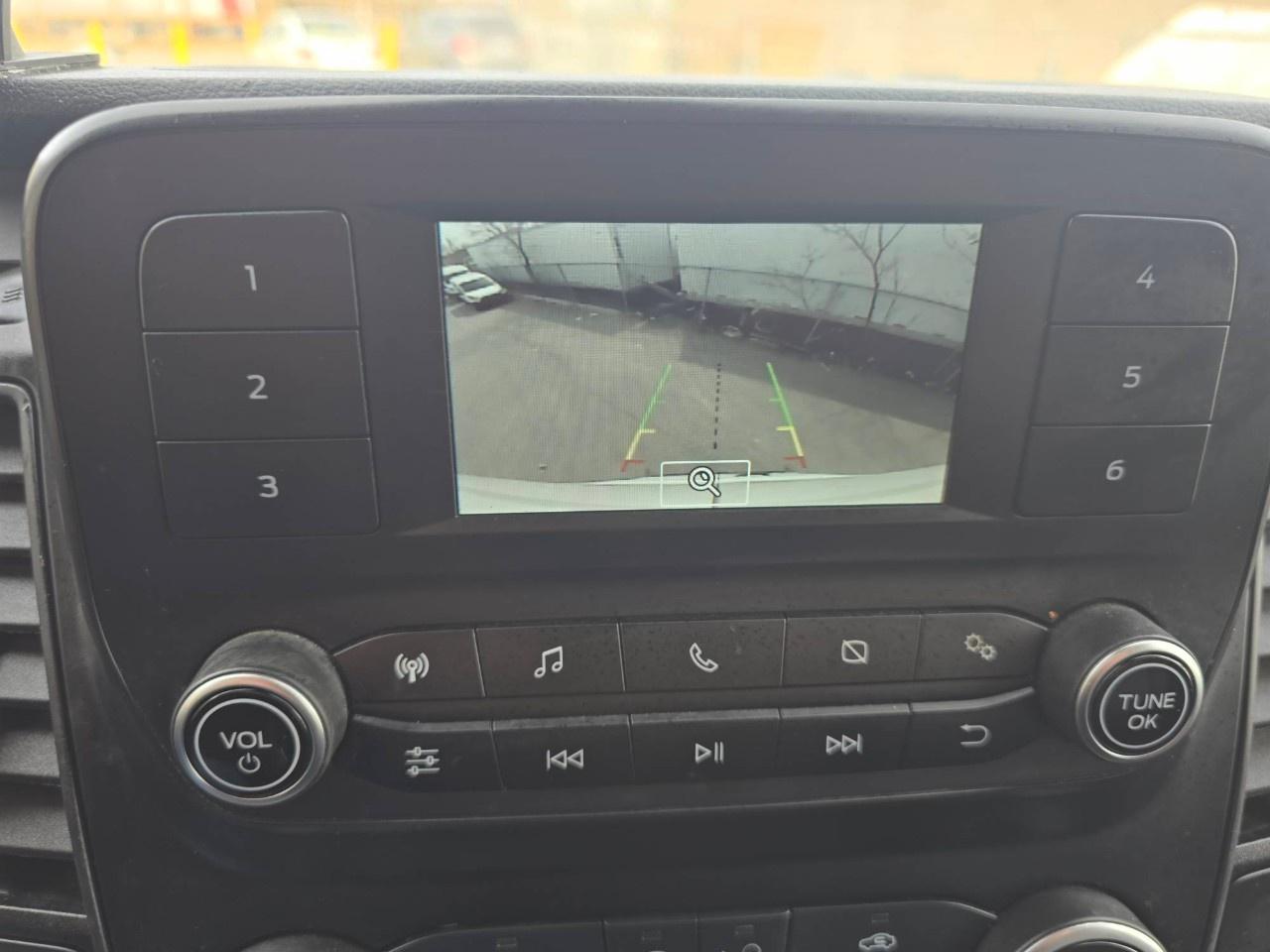 2023 Ford Transit Cargo Van T-250 148" EL Hi Rf 9070 GVWR RWD Photo