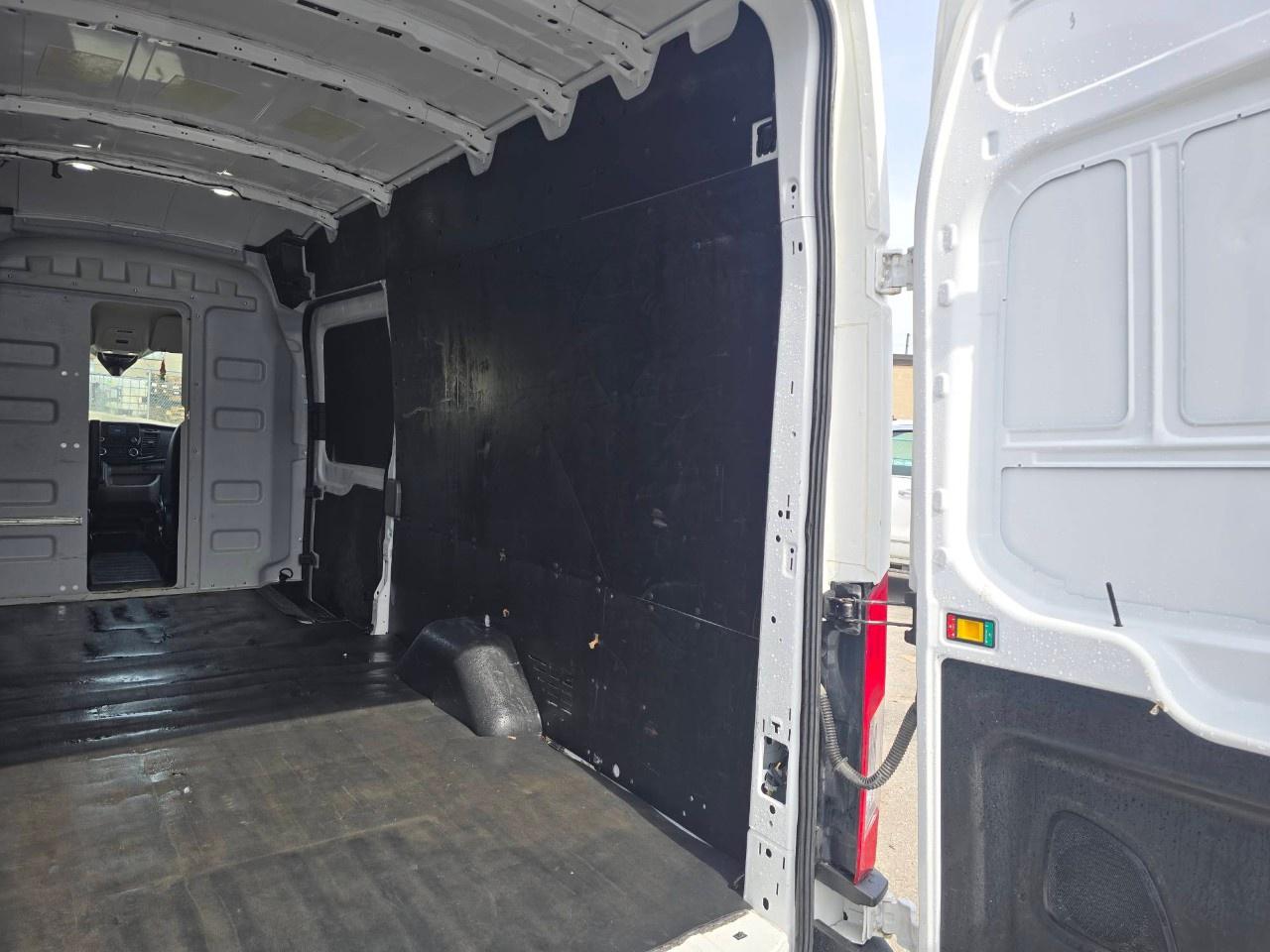 2023 Ford Transit Cargo Van T-250 148" EL Hi Rf 9070 GVWR RWD Photo