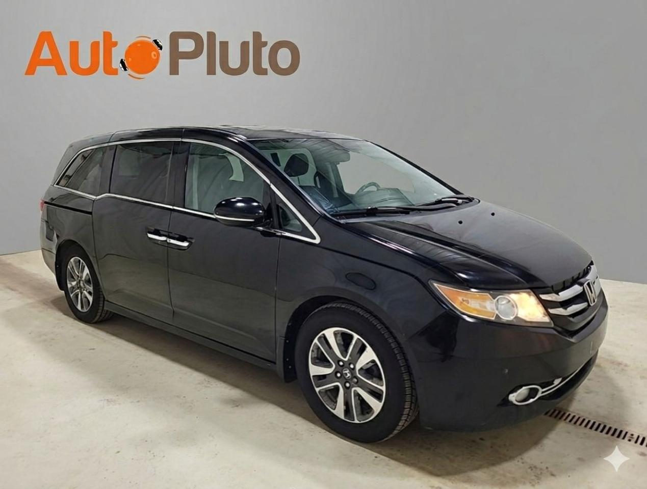 2014 Honda Odyssey Touring with Rear Entertainment System and Navigation Photo