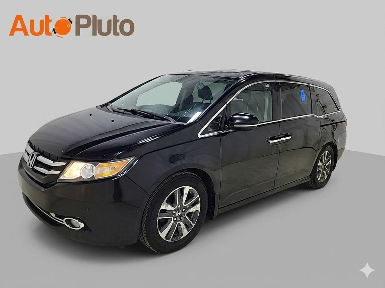 2014 Honda Odyssey Touring with Rear Entertainment System and Navigation Photo