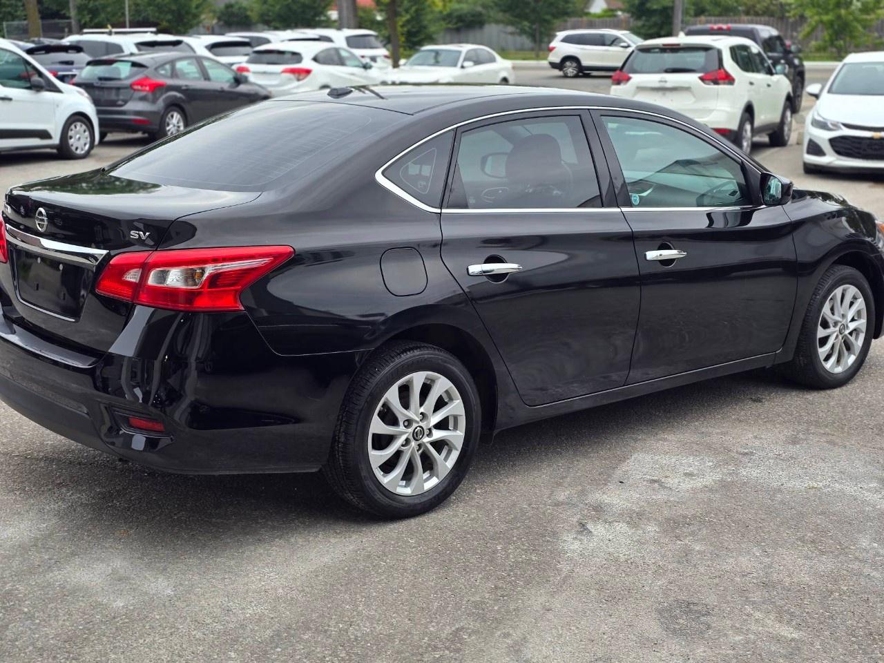 2016 Nissan Sentra 4DR SDN CVT SV Photo
