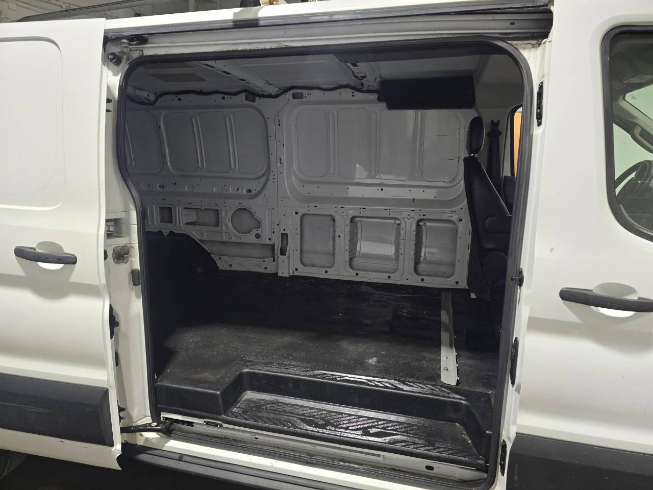 2021 Ford Transit Cargo Van T-150 148" Low Rf 8670 GVWR RWD Photo