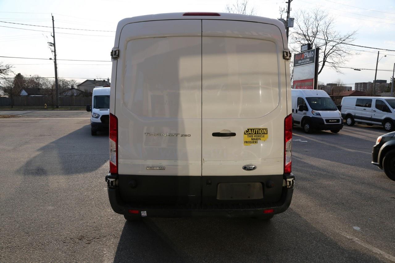 2016 Ford Transit Cargo Van T-250 148" Med Rf 9000 GVWR Sliding RH Dr Photo