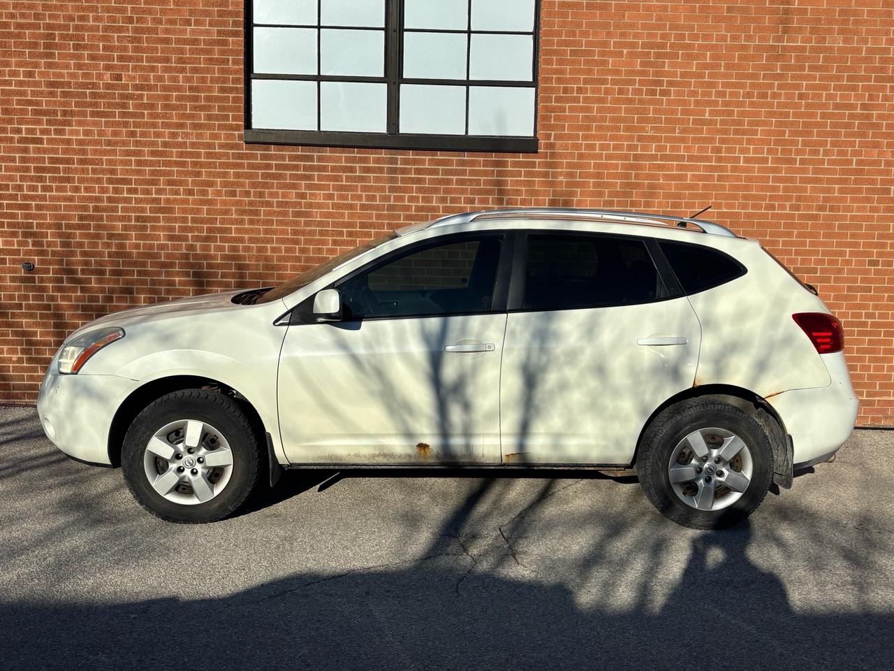 2009 Nissan Rogue AWD 4dr S Photo