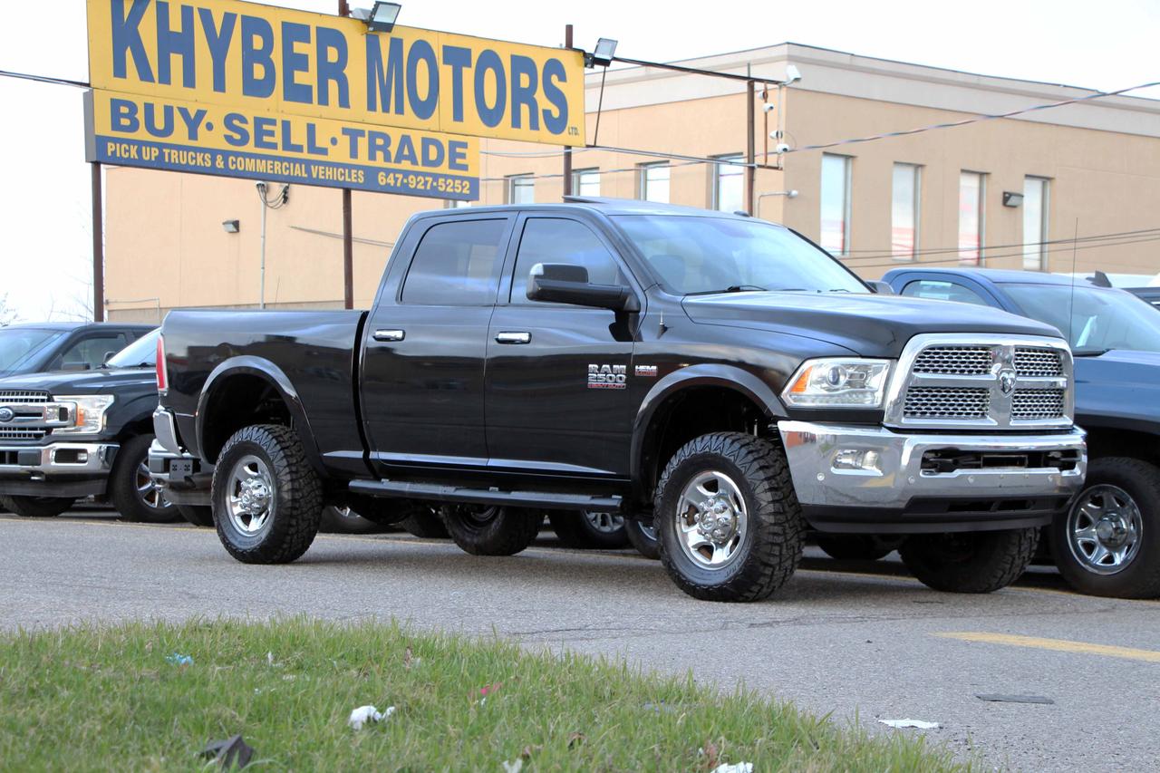 <p><strong>*Summer Sales Event On Now &ndash; $1,000 Off Every Vehicle Until August 31, 2026!</strong></p><p>2017 RAM 2500HD Laramie Power Wagon Crew Cab 6.4L Hemi 4x4 with 232,365 kilometers. Black on Black with wooden trim.&nbsp;<br>Laramie loaded with Leather, Sunroof, power seats with lumbar and memory, heated and cooled seats, heated steering wheel, parking sensors, front and rear diff locks with sway bar connect/disconnect, spray in bed liner, running boards, and more. Runs and drives smooth. Certified and backed by our 2 year power train warranty.&nbsp;</p><p>Car Fax Link Below, copy and paste:</p><p>https://vhr.carfax.ca/?id=AsQy4Blh3TzPoX2NZifwpEXZO4KyjBC%2F</p><p>All-In Price (CERTIFICATION & WARRANTY INCLUDED)<br>Was: $28,950 Now:$27,950 + Just Plus Tax and Licensing<br>No Hidden Charges or Extra Fees<br>Taxes and licensing not included in the price<br>For more HD images please visit khybermotors.com<br>2 Year Powertrain Warranty Covers:<br>1) Engine<br>2) Transmission<br>3) Head Gasket<br>4) Transaxle/Differential<br>5) Seals & Gaskets<br>Unlimited Kilometres, $1,000 Per Claim, $100 Deductible, $75 Activation fee.</p><p>Khyber Motors LTD Family Owned & Operated SINCE 2005<br>90 Kennedy Road South<br>Brampton ON L6W3E7<br>(647)-927-5252<br>Member of OMVIC and UCDA<br>Buy with Confidence!<br>Buy with Full Disclosure!<br>Monday-Friday 9:00AM - 8:00PM<br>Saturday 10:00AM - 6:00PM<br>Sunday by appointment only please call (416)-828-2144&nbsp;<br>To see more of our vehicles please visit Khybermotors.com</p>