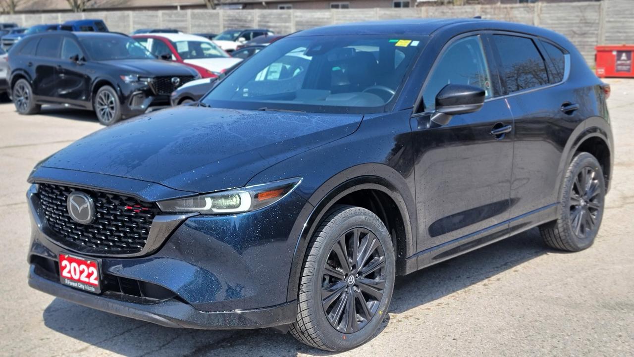 ?? 2022 Mazda CX-5 Sport Design  Fully Loaded, Stylish & Reliable! ??<br><br>Turn heads and drive with confidence in this 2022 Mazda CX-5 GT, a perfect blend of luxury, performance, and practicality. This SUV has been meticulously maintained and is in excellent conditionready for its next owner!<br><br>? Key Features:<br><br>2.5L SKYACTIV-G Engine  Smooth, responsive, and fuel-efficient<br>i-ACTIV AWD  Confident handling in all weather conditions<br>Leather-Trimmed Seats  Premium comfort with heated front & rear seats<br>Power Sunroof  Enjoy fresh air and natural light<br>10.25 Infotainment Display  With Apple CarPlay & Android Auto<br>Bose Premium Sound System  Crystal-clear audio experience<br>Navigation System  Get where you need to go with ease<br>Heads-Up Display  Keep your eyes on the road<br>Dual-Zone Climate Control  Personalized comfort for driver and passenger<br>Power Liftgate  Convenient access to cargo space<br>Keyless Entry & Push-Button Start<br><br>??? Safety & Driver Assistance:<br><br>Blind Spot Monitoring<br>Rear Cross Traffic Alert<br>Adaptive Cruise Control<br>Lane Keep Assist<br>Forward Collision Warning with Automatic Emergency Braking<br><br>This CX-5 GT delivers a premium driving experience without the premium price tag. Perfect for families, commuters, or anyone looking for a reliable and stylish SUV.<br><br>?? Priced to sell  dont miss out!<br><br>?? Message now to schedule a test drive or for more details!