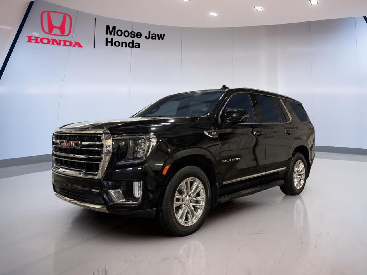 The 2022 GMC Yukon SLT is a full-size SUV built for families, travel, and year-round confidence in Saskatchewan. This used example at Moose Jaw Honda pairs a proven 5.3L EcoTec3 V8 engine with a 10-speed automatic transmission and 4-wheel drive for smooth power and strong road manners. With 57,260 km, it offers the space and capability many drivers want in a premium utility vehicle.

The 2022 GMC Yukon SLT stands out with its bold size, refined ride, and practical design. It is well suited for highway trips, daily errands, and weekend escapes. Its V8 performance brings solid passing power, while the advanced transmission helps keep the drive relaxed and controlled in changing road conditions.

FEATURES OF THE Yukon SLT

»» Full-size SUV with premium road presence
»» 5.3L EcoTec3 V8 engine performance
»» 10-speed automatic transmission for smooth shifts
»» 4-wheel drive for added traction

ADVANCED SAFETY FEATURES

»» Strong body structure for added protection
»» 4-wheel drive aids slippery road control
»» Large SUV design supports confident visibility
»» Modern chassis tuning promotes stable handling

PERFORMANCE AND EFFICIENCY

»» 5.3L EcoTec3 V8 delivers strong power
»» 10-speed automatic supports smooth acceleration
»» 4-wheel drive boosts all-season confidence
»» Balanced ride for highway and city

COMFORT AND CONVENIENCE

»» Spacious cabin for family travel comfort
»» Easy entry height for daily use
»» Large doors help passenger access
»» Quiet cruising feel on longer drives

TECHNONOLGY AND CONNECTIVITY

»» Clear driver information display layout
»» User-friendly controls within easy reach
»» Modern vehicle systems support convenience
»» Designed for simple everyday operation

CARGO SPACE

»» Large rear cargo area for gear
»» Full-size SUV shape aids versatility
»» Roomy cabin supports passenger belongings
»» Practical space for travel essentials

AWARDS & RECOGNITIONS

»» Best resale value, Kelley Blue Book, 2022

WHAT OTHER OWNERS LIKE

»» Strong V8 power for easy passing
»» Spacious interior for family road trips
»» Smooth highway ride and comfort
»» Confident winter traction with 4-wheel drive

This 2022 GMC Yukon SLT gives you the strength of a V8, the confidence of 4-wheel drive, and the versatility expected from a full-size SUV. It is a smart fit for drivers who need room, towing-ready capability from its truck-based design, and a composed ride for long distances.

At Moose Jaw Honda in Moose Jaw, this used 2022 GMC Yukon SLT offers a great mix of utility, comfort, and proven GMC engineering. If you want a large SUV with strong performance, practical space, and dependable all-season ability, this Yukon deserves a close look.

This 2022 GMC Yukon SLTs VIN is: 1GKS2BKD4NR182615.<p> and year-round confidence in Saskatchewan. This used example at Moose Jaw Honda pairs a proven 5.3L EcoTec3 V8 engine with a 10-speed automatic transmission and 4-wheel drive for smooth power and strong road manners. With 57</p>
<p> it offers the space and capability many drivers want in a premium utility vehicle.

The 2022 GMC Yukon SLT stands out with its bold size</p>
<p> while the advanced transmission helps keep the drive relaxed and controlled in changing road conditions.

FEATURES OF THE Yukon SLT

»» Full-size SUV with premium road presence
»» 5.3L EcoTec3 V8 engine performance
»» 10-speed automatic transmission for smooth shifts
»» 4-wheel drive for added traction

ADVANCED SAFETY FEATURES

»» Strong body structure for added protection
»» 4-wheel drive aids slippery road control
»» Large SUV design supports confident visibility
»» Modern chassis tuning promotes stable handling

PERFORMANCE AND EFFICIENCY

»» 5.3L EcoTec3 V8 delivers strong power
»» 10-speed automatic supports smooth acceleration
»» 4-wheel drive boosts all-season confidence
»» Balanced ride for highway and city

COMFORT AND CONVENIENCE

»» Spacious cabin for family travel comfort
»» Easy entry height for daily use
»» Large doors help passenger access
»» Quiet cruising feel on longer drives

TECHNONOLGY AND CONNECTIVITY

»» Clear driver information display layout
»» User-friendly controls within easy reach
»» Modern vehicle systems support convenience
»» Designed for simple everyday operation

CARGO SPACE

»» Large rear cargo area for gear
»» Full-size SUV shape aids versatility
»» Roomy cabin supports passenger belongings
»» Practical space for travel essentials

AWARDS & RECOGNITIONS

»» Best resale value</p>
<p> 2022

WHAT OTHER OWNERS LIKE

»» Strong V8 power for easy passing
»» Spacious interior for family road trips
»» Smooth highway ride and comfort
»» Confident winter traction with 4-wheel drive

This 2022 GMC Yukon SLT gives you the strength of a V8</p>
