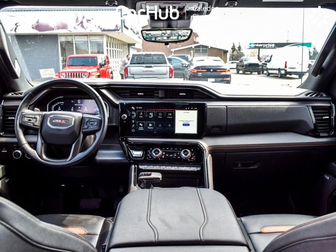 2024 GMC Sierra 1500 AT4 4WD Crew Cab 147" 6.2L 5 passengers with captain chair Leather Photo