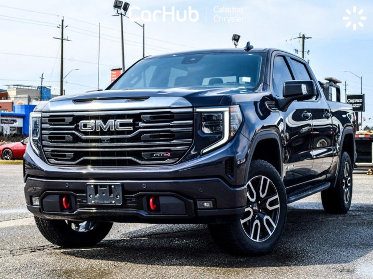 2024 GMC Sierra 1500 AT4 4WD Crew Cab 147" 6.2L 5 passengers with captain chair Leather Photo