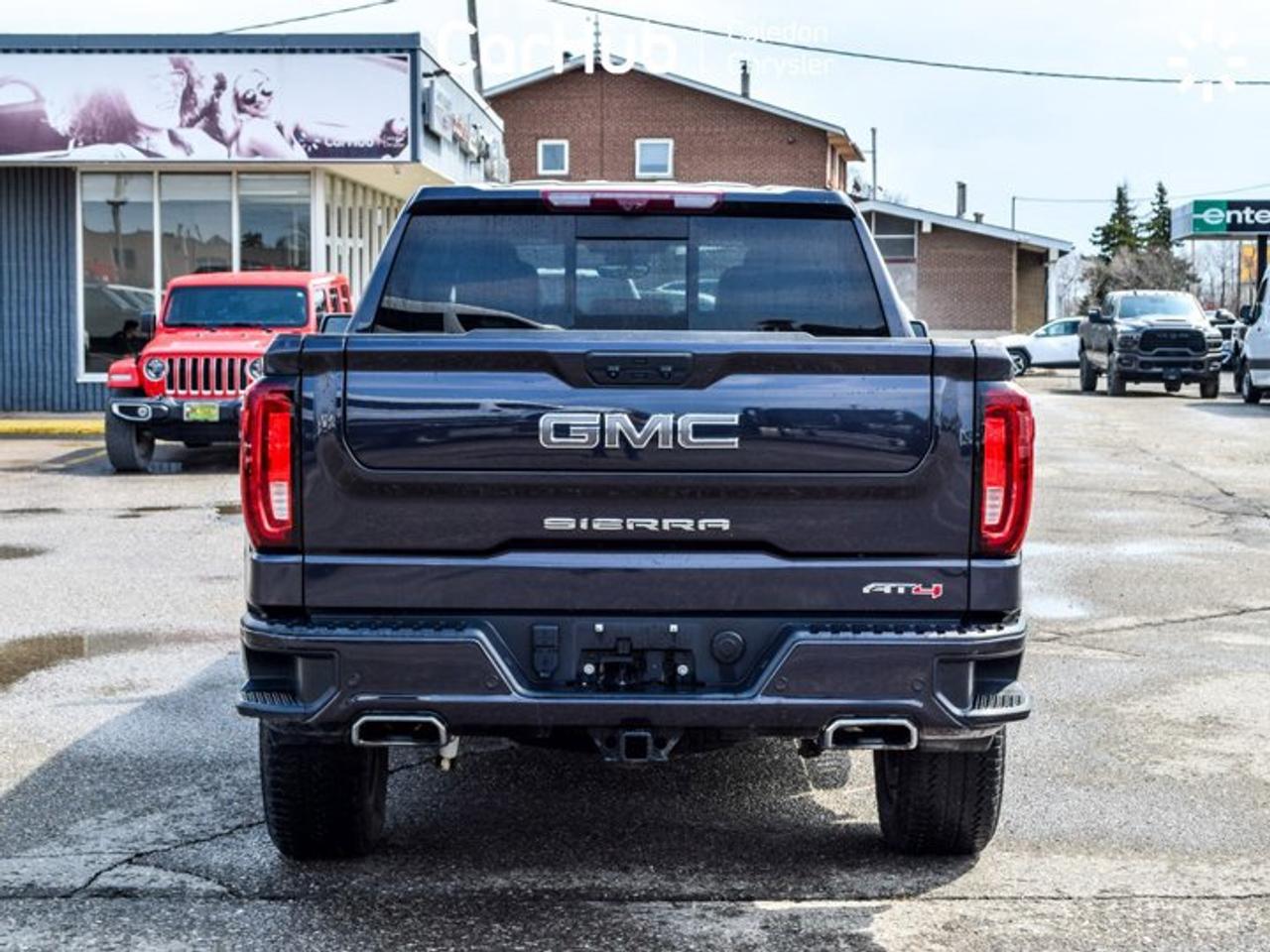 2024 GMC Sierra 1500 AT4 4WD Crew Cab 147" 6.2L 5 passengers with captain chair Leather Photo