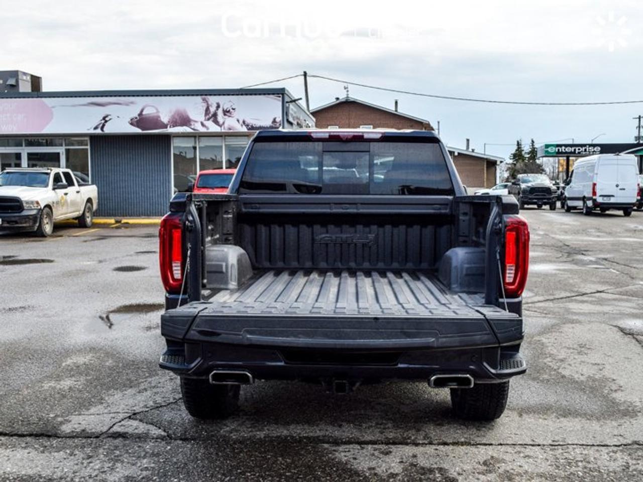2024 GMC Sierra 1500 AT4 4WD Crew Cab 147" 6.2L 5 passengers with captain chair Leather Photo