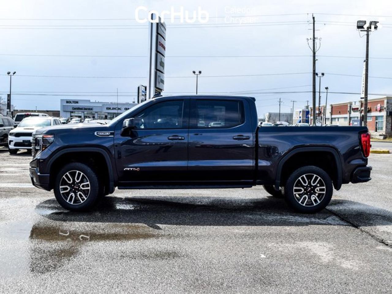 2024 GMC Sierra 1500 AT4 4WD Crew Cab 147" 6.2L 5 passengers with captain chair Leather Photo