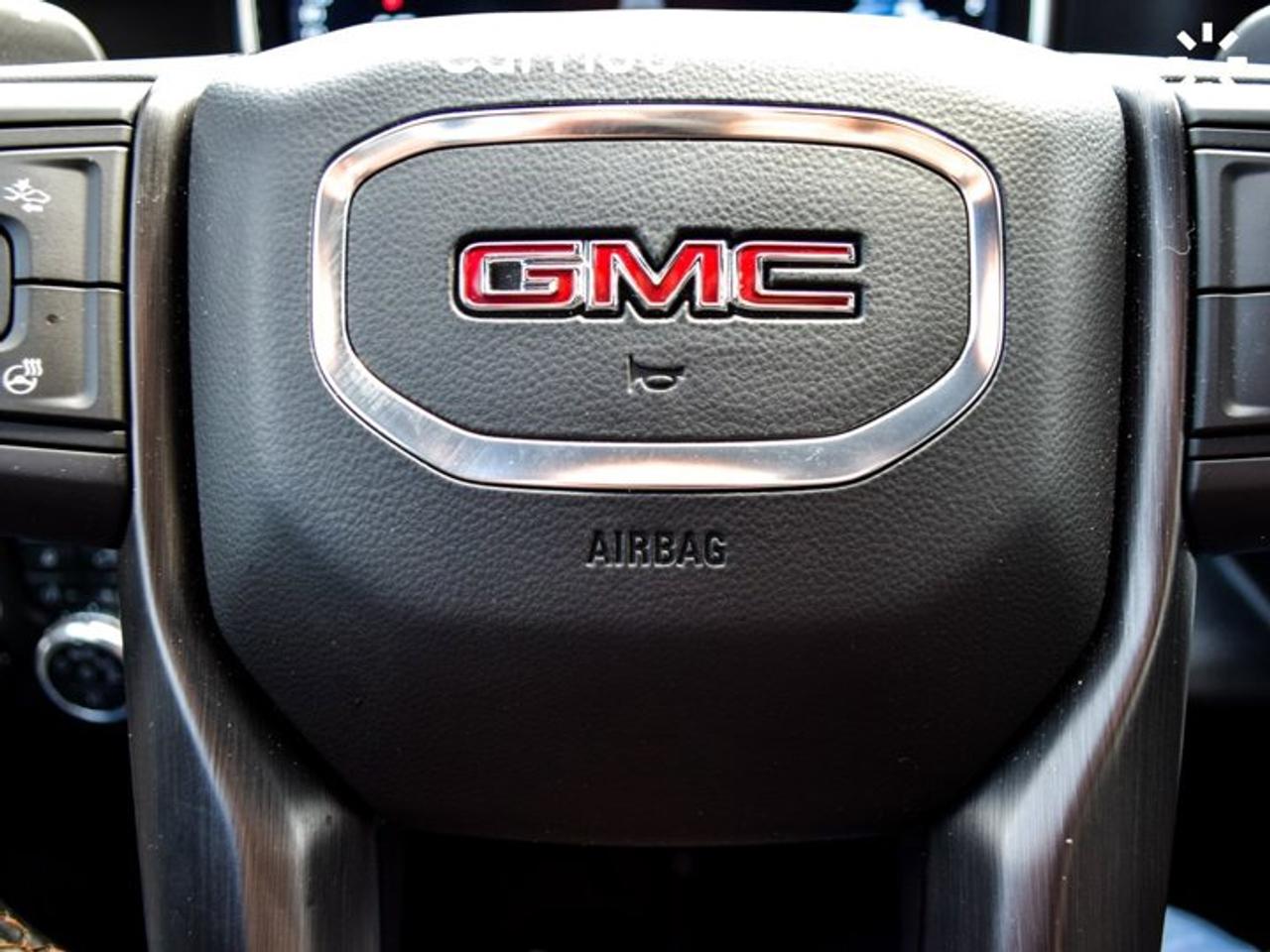 2024 GMC Sierra 1500 AT4 4WD Crew Cab 147" 6.2L 5 passengers with captain chair Leather Photo