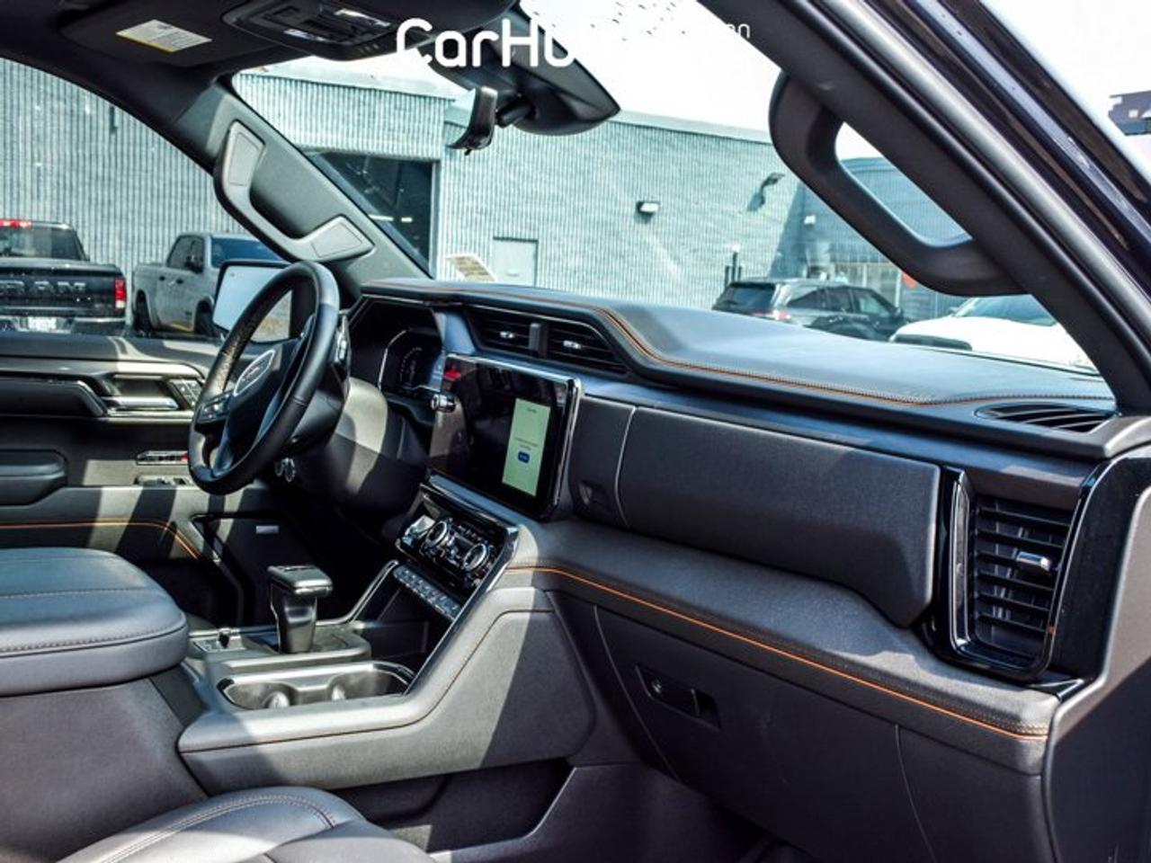 2024 GMC Sierra 1500 AT4 4WD Crew Cab 147" 6.2L 5 passengers with captain chair Leather Photo