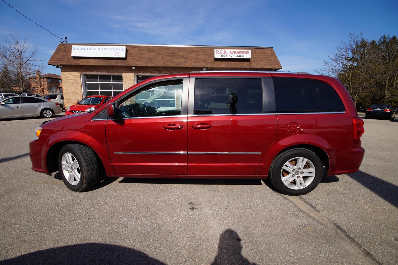 <p>Looking for a reliable and spacious family vehicle? R.E.R. Automobiles Ltd. has a fantastic option for you: a well-maintained 2014 Dodge Grand Caravan Crew! This versatile minivan is ready to tackle all of lifes adventures, offering plenty of room for passengers and cargo. With its practical design and comfortable interior, the Grand Caravan Crew is perfect for everything from daily commutes to weekend getaways. This particular model, sporting a vibrant red exterior and a sophisticated black and tan interior, is sure to turn heads while providing a comfortable driving experience. Clocking in at 182,637km, its ready for many more journeys.</p><p>This 2014 Dodge Grand Caravan Crew is equipped with a flexible fuel system and an automatic transmission for a smooth and efficient ride. Front-wheel drive provides confident handling, while the four-door design ensures easy access for everyone. The Grand Caravan Crew is a proven choice for families, offering a blend of practicality, comfort, and reliability thats hard to beat.</p><p>Heres a taste of what makes this Grand Caravan Crew stand out:</p><ul><li><strong>Family-Friendly Space:</strong> Designed with your family in mind, this Grand Caravan offers ample room for passengers and cargo, making every trip comfortable and convenient.</li><li><strong>Ready for Adventure:</strong> The flexible fuel system ensures that you can fuel up where you need to go.</li><li><strong>Smooth Automatic Transmission:</strong> Enjoy effortless driving with the automatic transmission, perfect for city streets and highway cruises.</li><li><strong>Stylish Design:</strong> The eye-catching red exterior paired with the sophisticated black and tan interior creates a stylish and inviting cabin.</li><li><strong>Proven Reliability:</strong> With the proven Dodge reliability, this Grand Caravan is a practical choice for all your needs.</li></ul><p><strong><em>Powered by AutoIntelligence&trade;</em></strong> Vehicle information has been generated using artificial intelligence and is provided for informational purposes only. While efforts are made to ensure accuracy, please confirm all details directly with the dealer.</p>