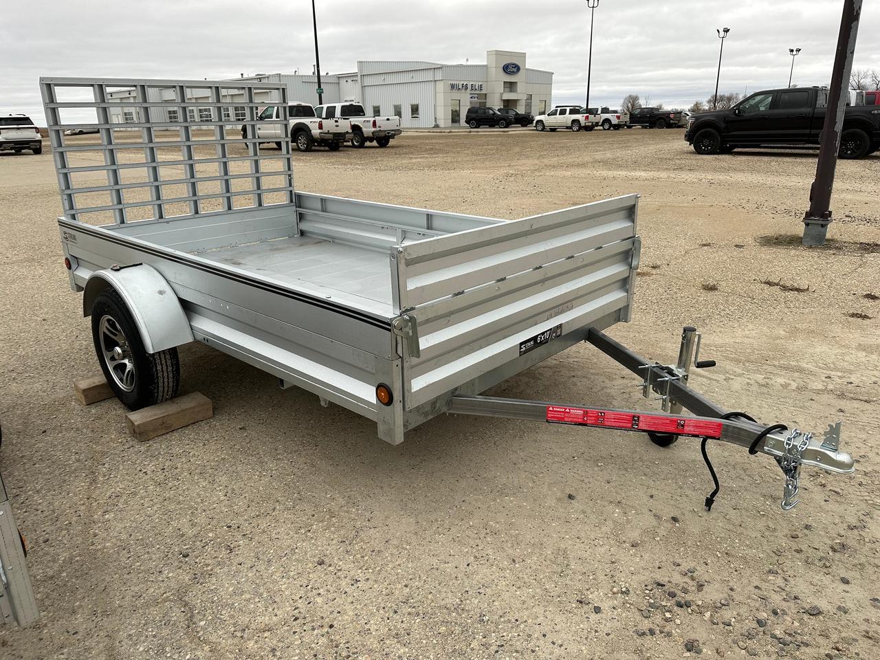 <p>This&nbsp;Stirling&nbsp;5 x 10 utility trailer with a 36 landscape rear gate features an extendable front allowing you to extend the bed of the trailer by&nbsp;15 for&nbsp;additional&nbsp;hauling capacity. The drive-on landscape gate is ideal for loading motorized vehicles such as lawn tractors, and it will also fold flat inside the bed to accommodate longer loads such as lumber.&nbsp;LED sealed lights, protected wiring, radial tires, EZ Lube hubs, and a torsion suspension that will ensure a smoother ride, better cargo&nbsp;protection&nbsp;and minimal maintenance. You can be confident that you are getting the best value and performance with these features combined with the Premium Galvalume Plus finish. With a payload capacity of 2100 lbs., this trailer is great for transporting a range of items, including ATVs, motorbikes, camping/sporting equipment, and building and landscaping materials.&nbsp;<br><br>Includes aluminum wheels, aluminum spare, tongue jack, and rear landscape gate!&nbsp;<br><br>G.V.W.R:&nbsp;2720&nbsp;lbs.&nbsp;Payload: 2100&nbsp;lbs.&nbsp;Curb&nbsp;Weight:&nbsp;620&nbsp;lbs&nbsp;<br><br>Bed Width: 5&nbsp;Bed Length: 10 to 113&nbsp;Front gate extends&nbsp;the&nbsp;bed&nbsp;of the trailer by 15 and the fear gate folds inside the bed of the trailer to&nbsp;accommodate&nbsp;longer loads.&nbsp;<br><br>Suspension:&nbsp;3500&nbsp;lbs&nbsp;Torsion axle,&nbsp;Wheel size: ST175/80R13 LRC&nbsp;Coupler size: 2&nbsp;<br><br>EZ Lube hubs provide ease of maintenance and added bearing protection&nbsp;<br><br>Recessed in-floor tie downs allow for convenient load security&nbsp;<br><br>Galvalume Plus steel offers twice the protection of traditional galvanized steel&nbsp;<br><br>Made In Canada with domestic and imported parts.&nbsp;</p>