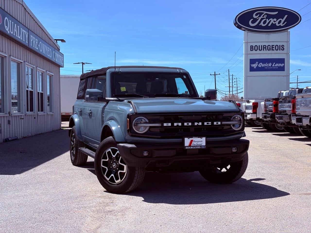 <p>Explore the adventurous spirit of the 2021 Ford Bronco Outer Banks, featuring a striking gray exterior and a robust 4×4 drivetrain that promises exceptional off-road and on-road handling. This SUV is a perfect blend of rugged capability and refined style.</p><p>From the outside, the Bronco showcases its bold design, capturing attention with its commanding presence. Inside, the black interior provides a sophisticated contrast, marrying luxury with durability. Find comfort in features like power windows and air conditioning, ensuring a pleasant journey regardless of the destination.</p><p>Stay connected and entertained with the Bronco's impressive suite of technology including smart device integration, Bluetooth connection, and a satellite radio system. The backup camera and brake assist lend an extra layer of safety, while features like keyless entry and a Wi-Fi hotspot provide modern convenience and assurance.</p><p>If you're an adventurous spirit yearning for freedom and exploration, the Ford Bronco Outer Banks is engineered to meet your trails with confidence. Contact our dealership today to learn more about how you can make this versatile vehicle your own.</p> <p><strong>Why Choose the Bourgeois Auto Group?</strong></p><p>For 80 years, Bourgeois Auto Group has been delivering exceptional automotive experiences. Our factor trained teams work to ensure you receive the shopping experience you deserve; whether you're looking for a new or new-to-you vehicle.</p><p>Shop 24/7 with our online showroom and chat service, ensuring convenience every step of the way. No hidden fees, full disclosure, and every pre-owned vehicle comes with a Carfax® report for peace of mind.</p><p>We offer a wide selection of pre-owned vehicles, all competitively priced using real-time market data. Get the best deal on your purchase and trade-in with our free Live Market Analysis report.</p><p>Looking to sell your car? We buy any make or modelno purchase required. Our simple to use online trade valuation tool will provide you with a clear, transparent selling experience whether you buy our car or not.</p><p>Backed by hundreds dedicated employees across 4 convenient locations, were here to meet all your automotive needs. Visit us in Midland or Parry Sound and explore our inventory or schedule your next service today.</p> <p><strong>Financing Your Next Vehicle with Bourgeois Motors Ford in Midland:</strong></p><p>At Bourgeois Motors Ford, we make financing your next vehicle simple and stress-free! Our team works with trusted lenders to find flexible options tailored to your budget. Drive away with confidenceapply today!</p><p>Take advantage of our online pre-qualification tool, backed by Equifax and TD Bank to find the payment that works for you. Simply <a href=https://www.bourgeoismotors.com/free-credit-check/ rel=nofollow><strong>CLICK HERE</strong></a><strong> </strong>to use our secure online credit tool with no impact to your credit.</p>