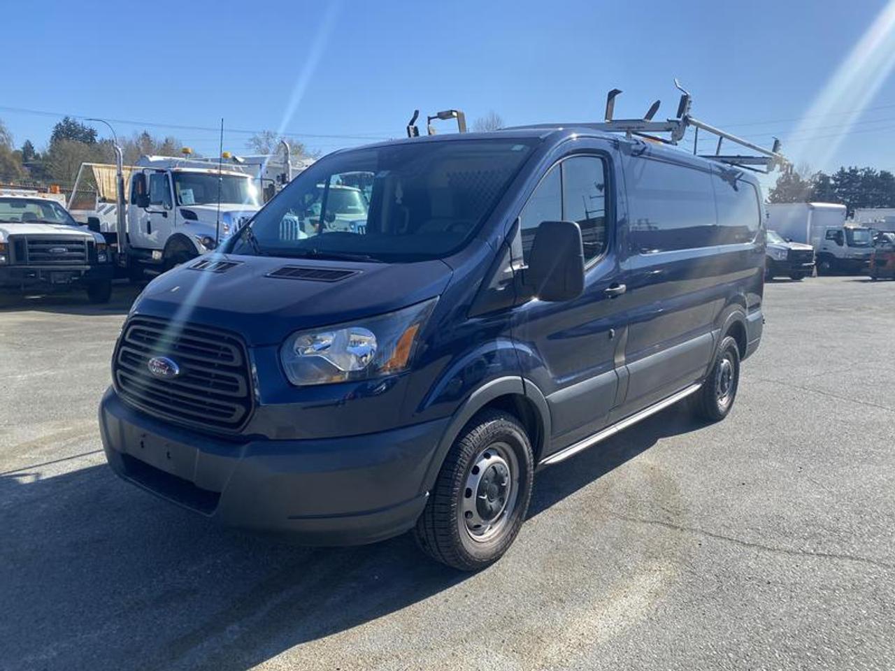 2016 Ford Transit 150 Van Low Roof Cargo Van. 130-in. WB With Ladder Rack and Shelving, 3.7L, 6 cylinder, 2 door, automatic, RWD, 4-Wheel ABS, cruise control, air conditioning, AM/FM radio, power door locks, power windows, power mirrors, blue exterior, grey interior, cloth.  $23,850.00 plus $375 processing fee, $24,225.00 total payment obligation before taxes.   Listing report, warranty, contract commitment cancellation fee, financing available on approved credit (some limitations and exceptions may apply). All above specifications and information is considered to be accurate but is not guaranteed and no opinion or advice is given as to whether this item should be purchased. We do not allow test drives due to theft, fraud, acts of vandalism and undetectable impaired driving. Instead we provide the following benefits: Complimentary Warranty (with options to extend), Limited Money Back Satisfaction Guarantee on Fully Completed Contracts, Contract Commitment Cancellation, and an Open-Ended Sell-Back Option. Ask seller for details or call 604-522-REPO(7376) to confirm listing availability.